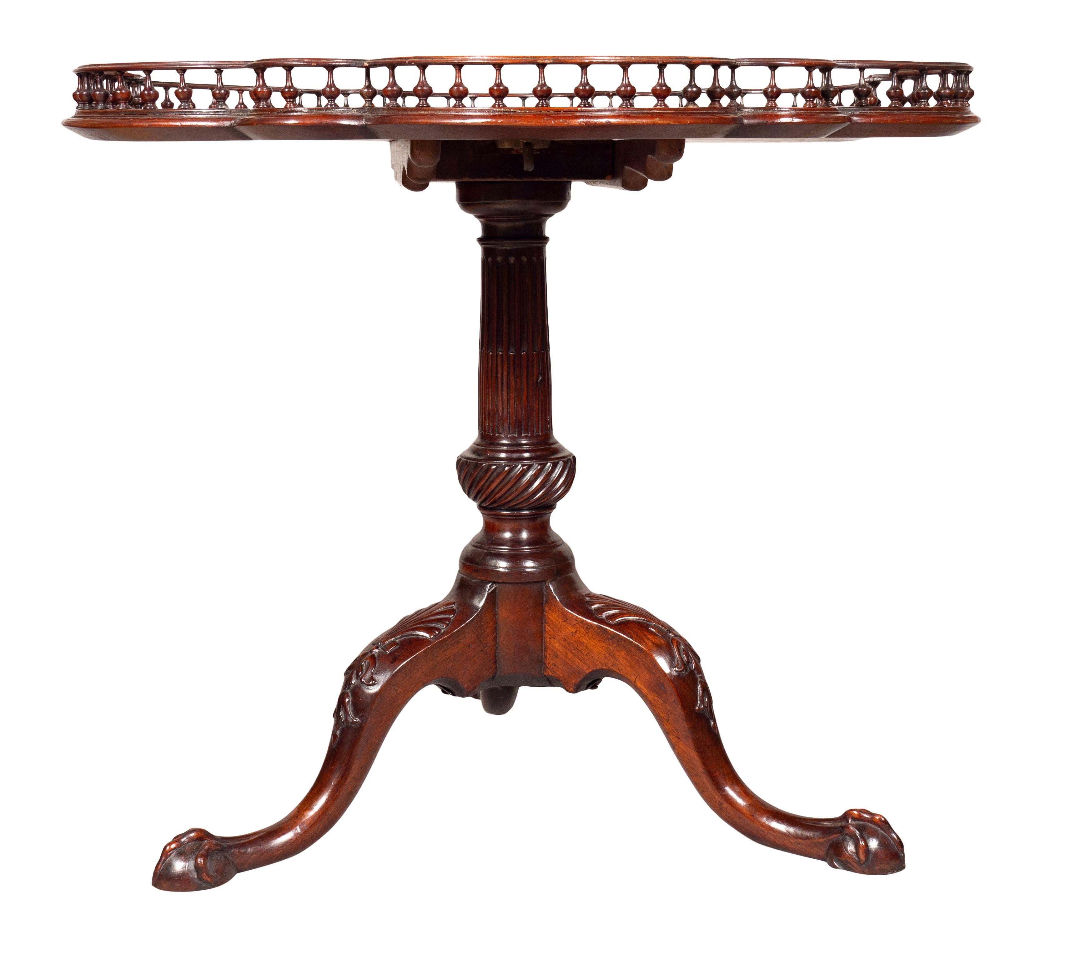 A beautiful table with elaborately shaped and spindled top. Fine timbers. Wonderfully proportioned and build with strength and quality in mind. Twelve lobed top of very generous proportions. The support turned and stop fluted and flattened spiral