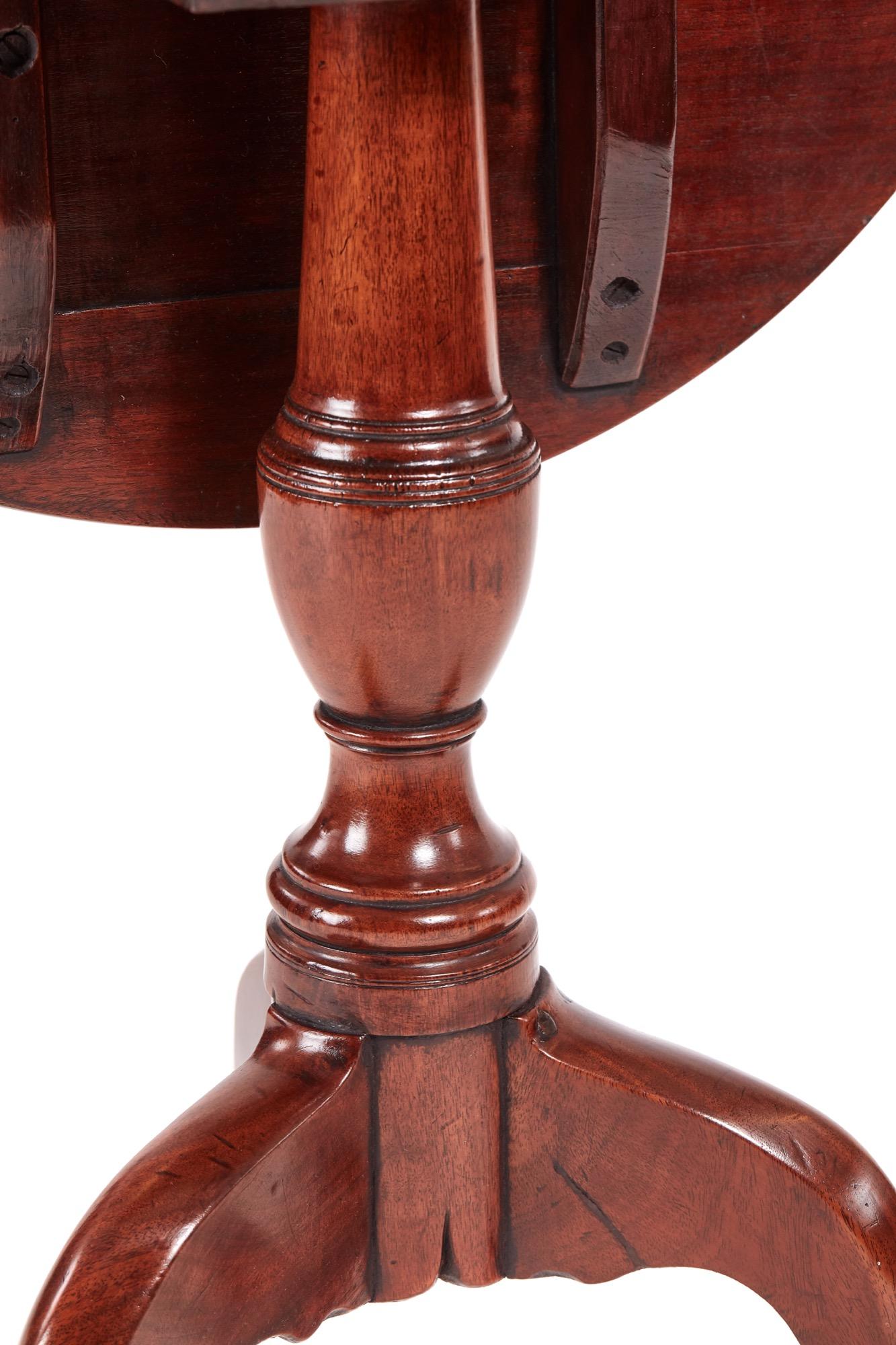 Fine George III antique mahogany tripod table with an attractive solid round mahogany top supported by a turned shaped pedestal raised on three shaped cabriole legs with pad feet.

WORLDWIDE SHIPPING

We are able to ship this item internationally. 