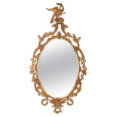 Magnifique miroir ovale doré George III