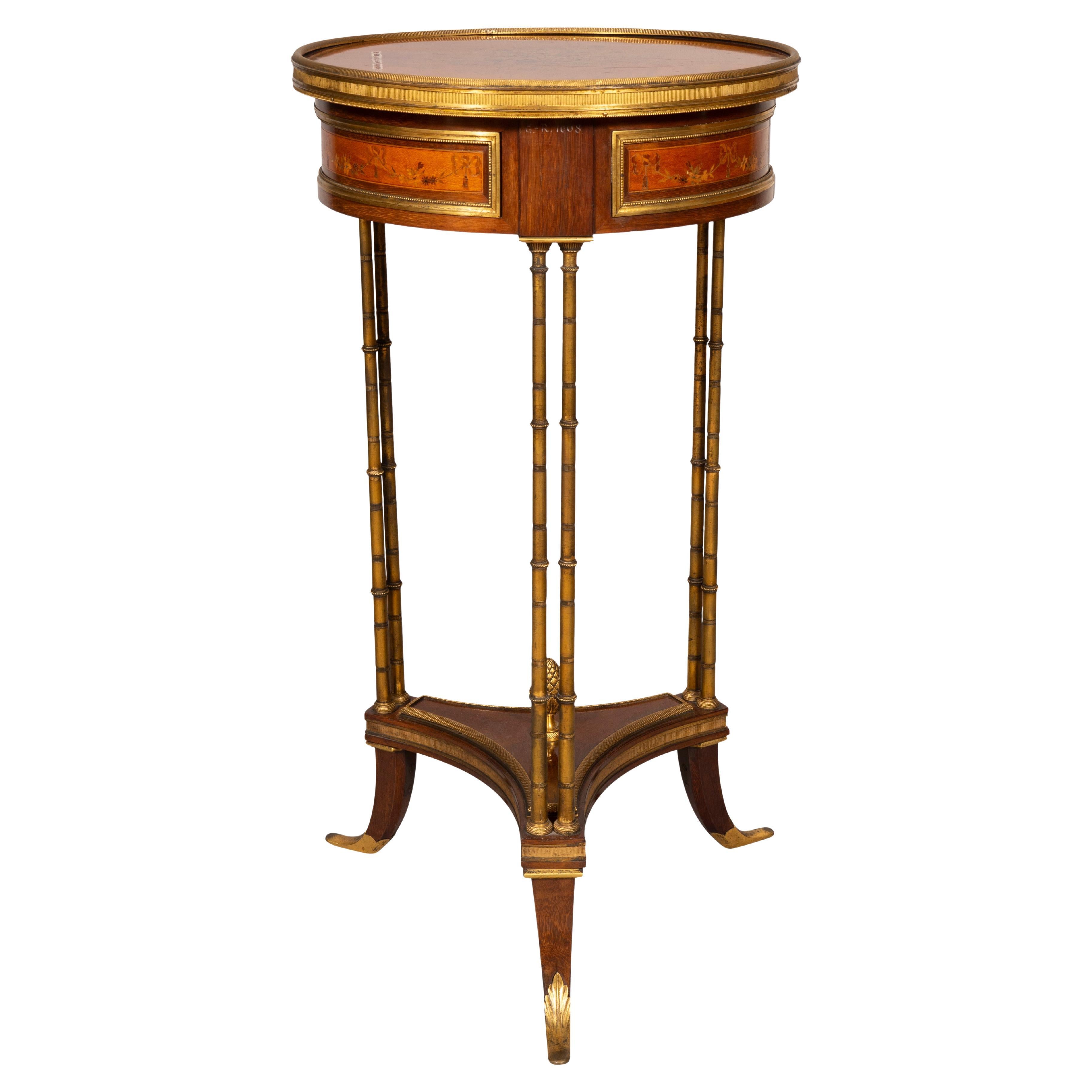 Fine table de style George III en bois de satin et palissandre
