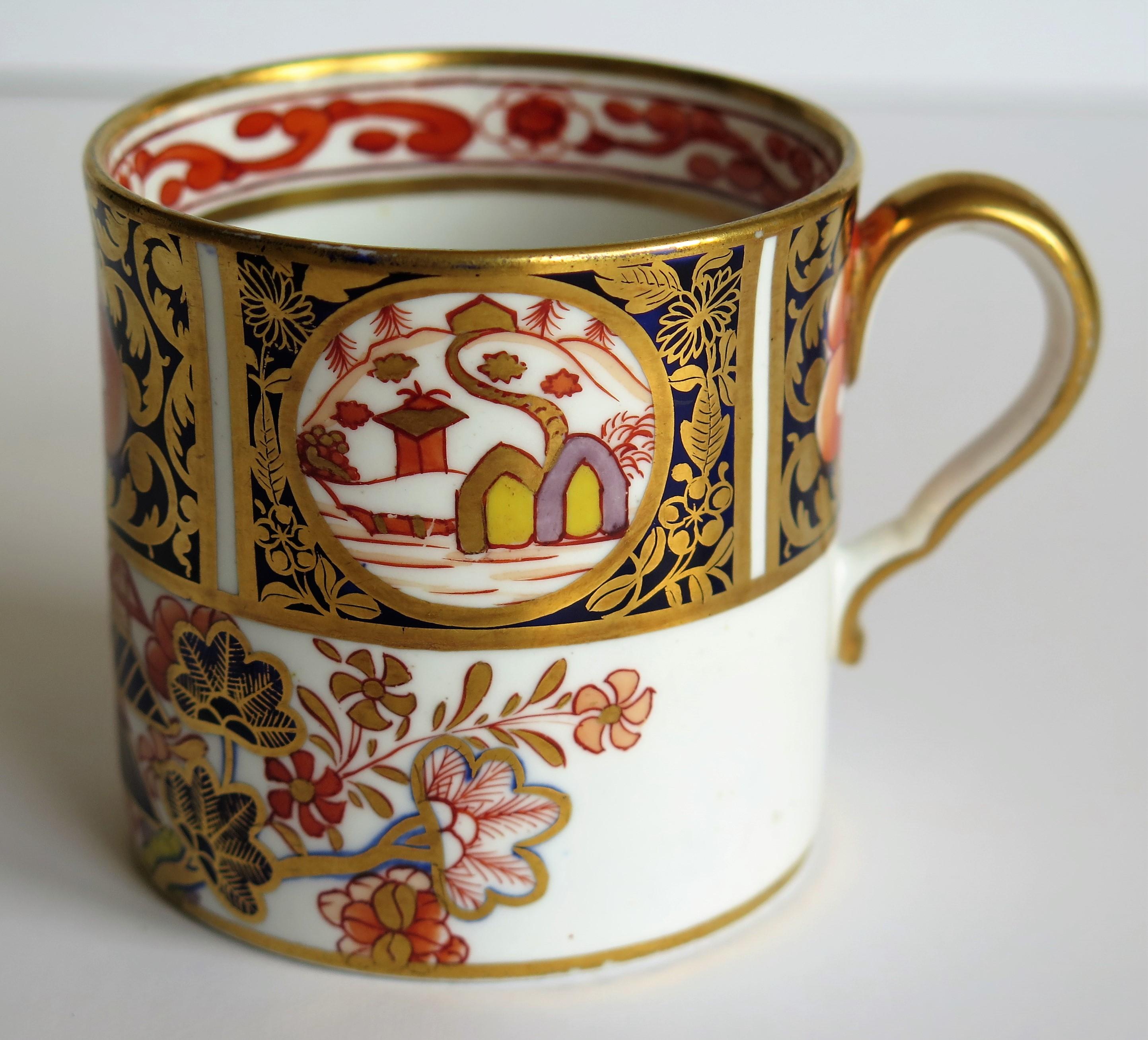 This is a fine example of an English George III period, Spode porcelain, coffee can, hand painted in pattern 1956 and dating from the early 19th century, circa 1810.

The coffee can or cup is nominally straight sided and has the Spode loop handle