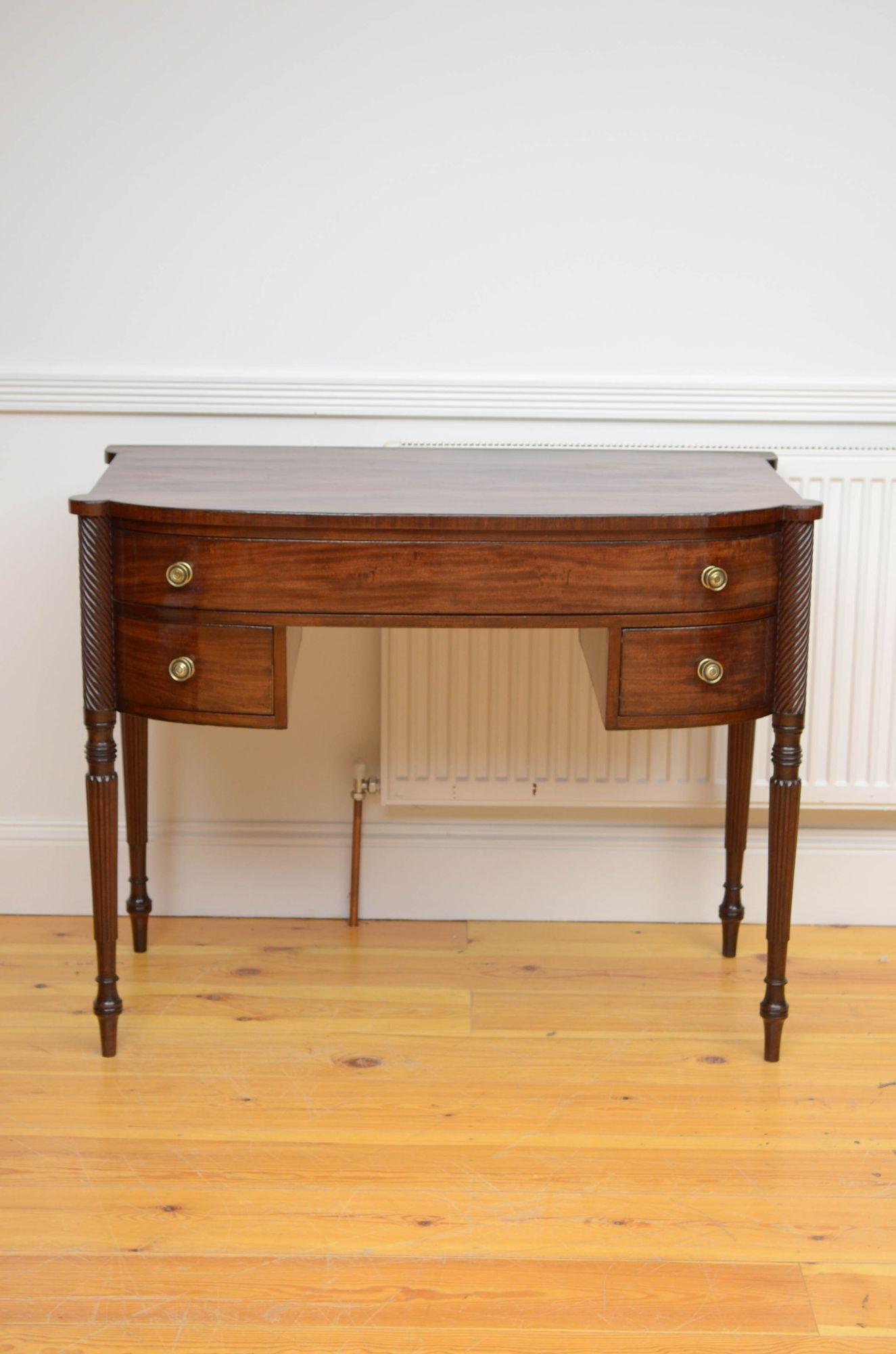 Sn5351 Fine quality George III mahogany dressing or sideboard of bow fronted outline, having beautifully figured mahogany top with ebonised inlaid edge above one long and two short oak lined drawers fitted with original brass knobs, flanked by