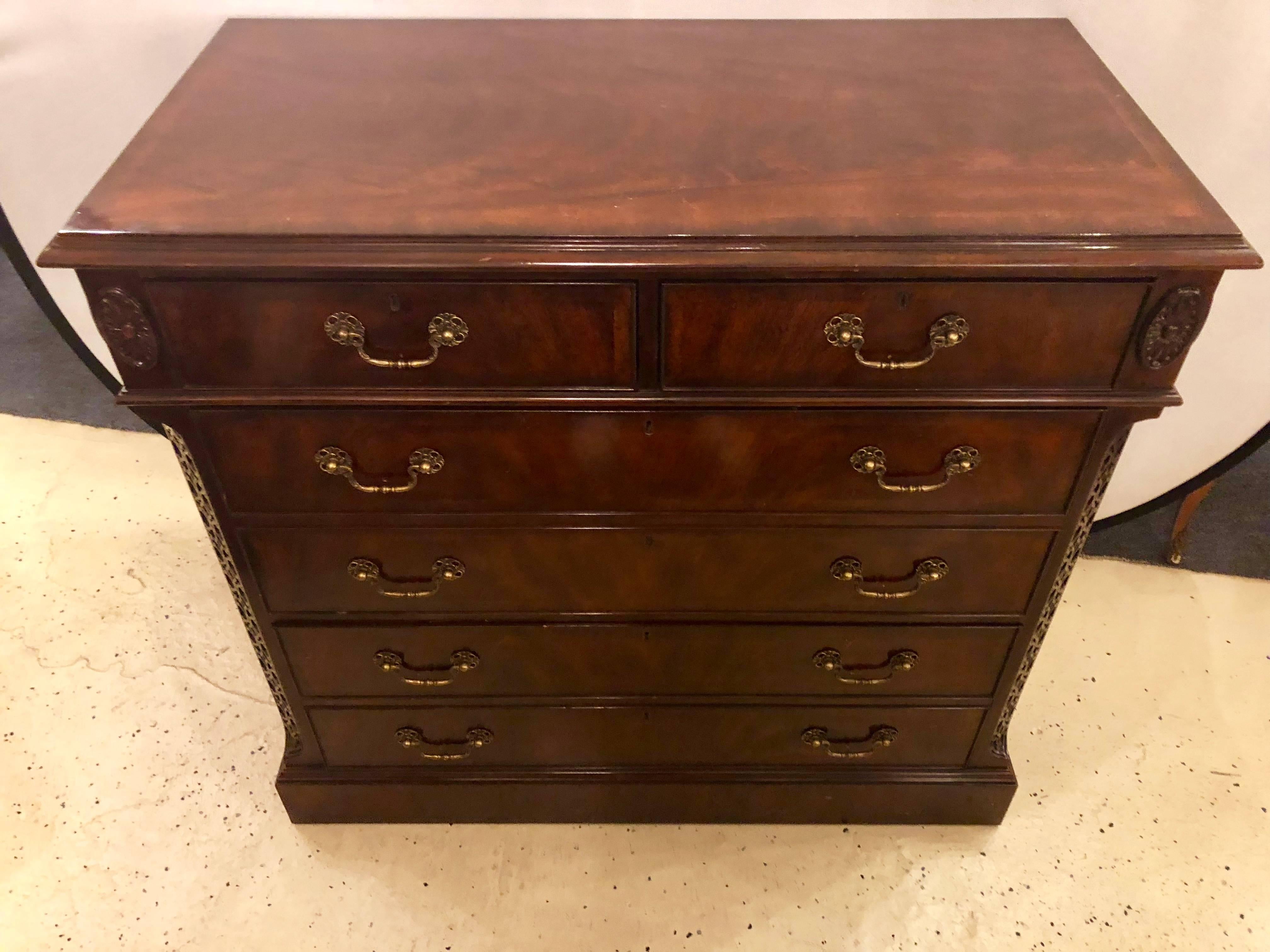 A fine flame mahogany double file cabinet credenza having oak secondaries. This fine chest of drawers is certain to add glamour to any home or office setting. Having two upper drawers and two lower file cabinet drawers all with oak secondary woods