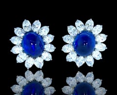 Fine GIA graded Sapphires, 16.77cts., with White Diamonds in 18K Earrings