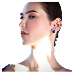 Fine GIA graded Sapphires, 16.77cts., with White Diamonds in 18K Earrings