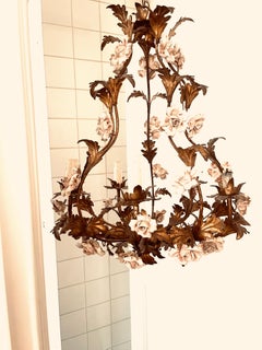 Fine Gild Wrought- Iron with a Multitude of Porcelain Flowers , By Baguès.