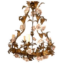 Fine Gild Wrought- Iron with a Multitude of Porcelain Flowers , By Baguès.