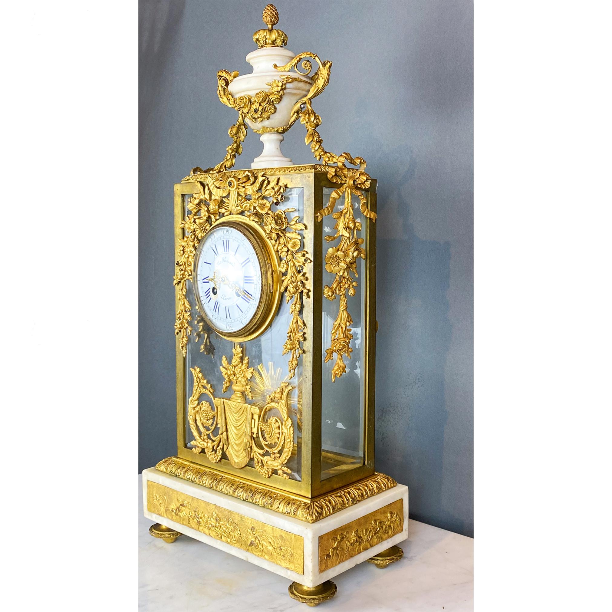 French Fine Gilt Bronze and Glass Clock with Sun Pendulum, Floral and Urn Details For Sale