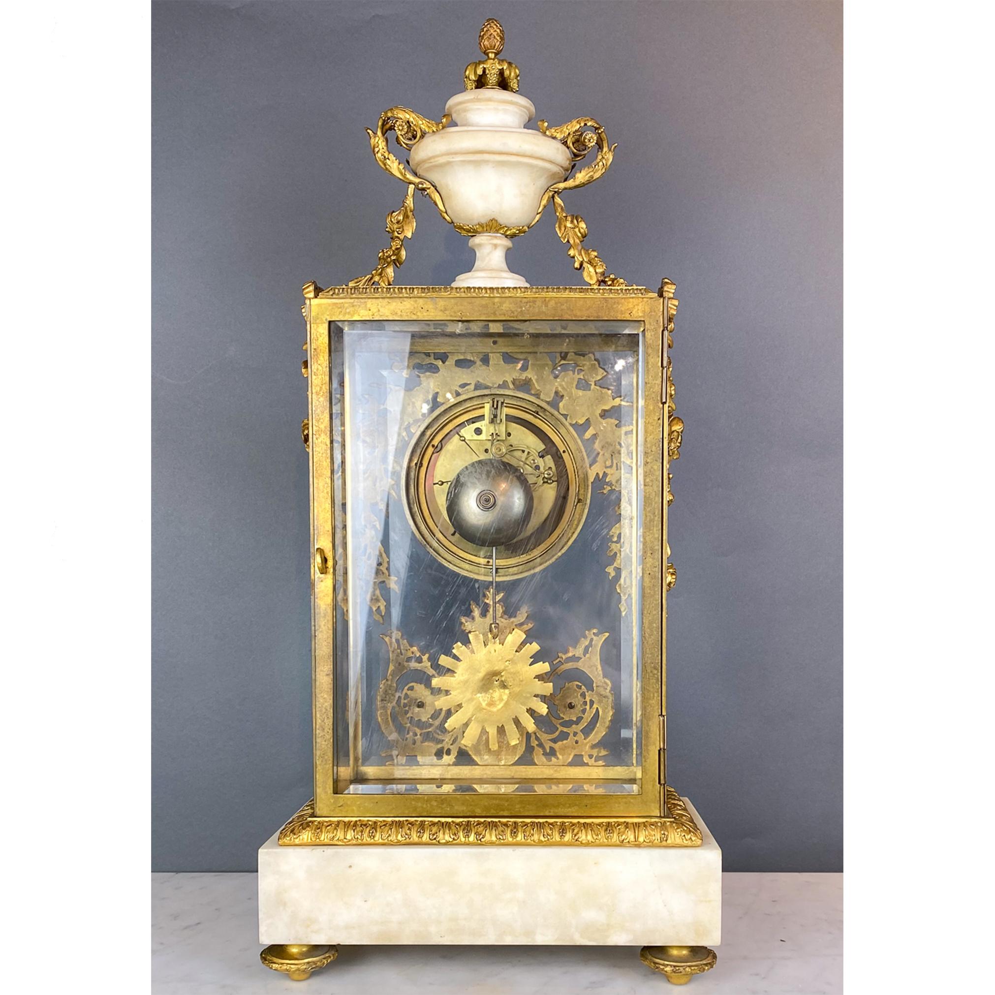 Fine Gilt Bronze and Glass Clock with Sun Pendulum, Floral and Urn Details For Sale 3