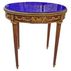 Table montée en bronze doré avec plateau en lapis-lazuli