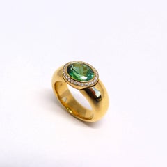 Ring in Rose Gold with 1 Green Tourmaline and Diamonds.