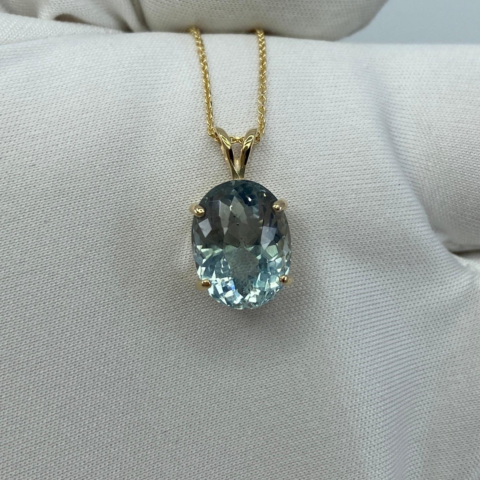 Fine Natural Greenish Blue Aquamarine Pendant Necklace.

4.82 Carat Aquamarine with a stunning unique greenish blue colour set in a fine 14k yellow gold solitaire pendant.
The aquamarine has  an excellent fancy oval cut showing lots of brightness