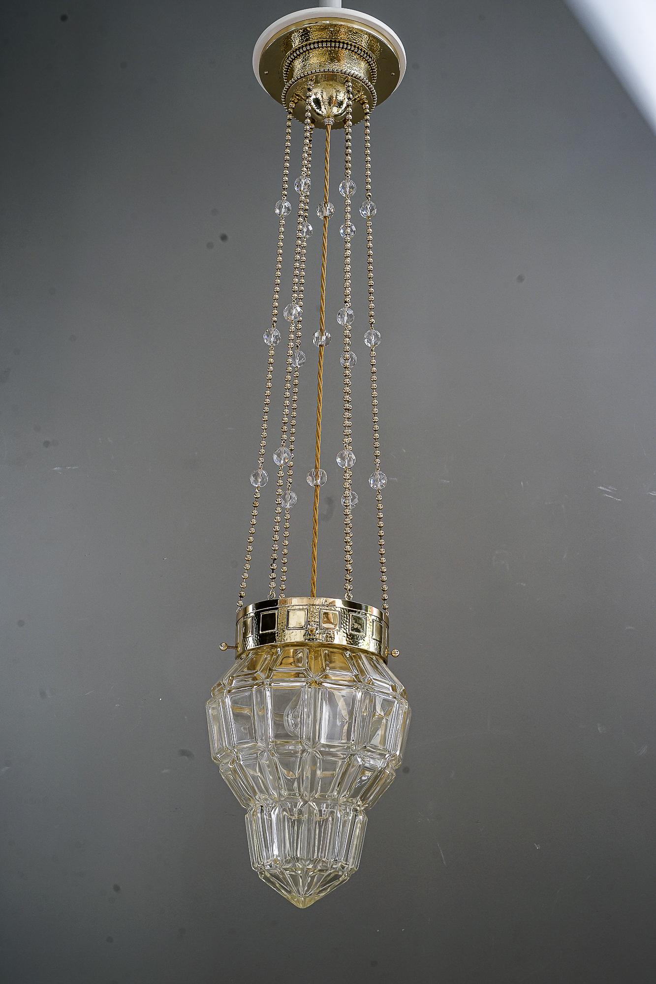 Austrian Fine Hammered Pendant with a High Quality Glass Shade Vienna Around 1920s For Sale