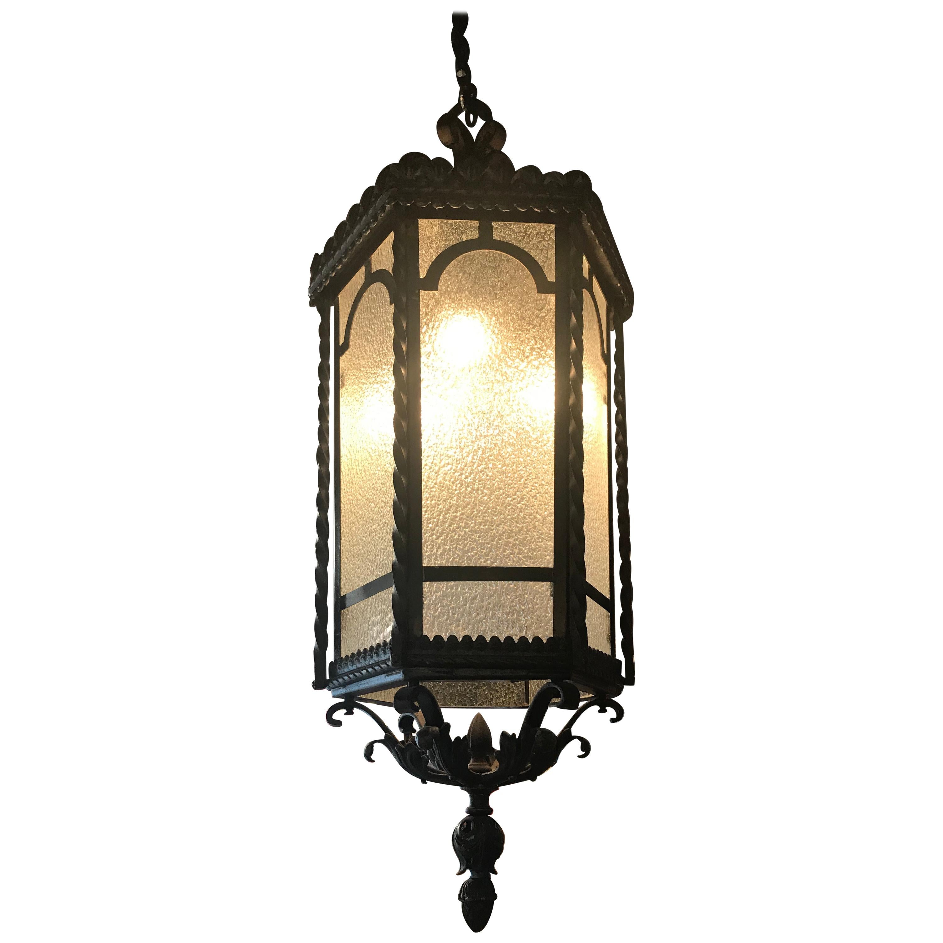 Fine Hand Forged Eight-Light Iron Lantern with Glass Panels For Sale