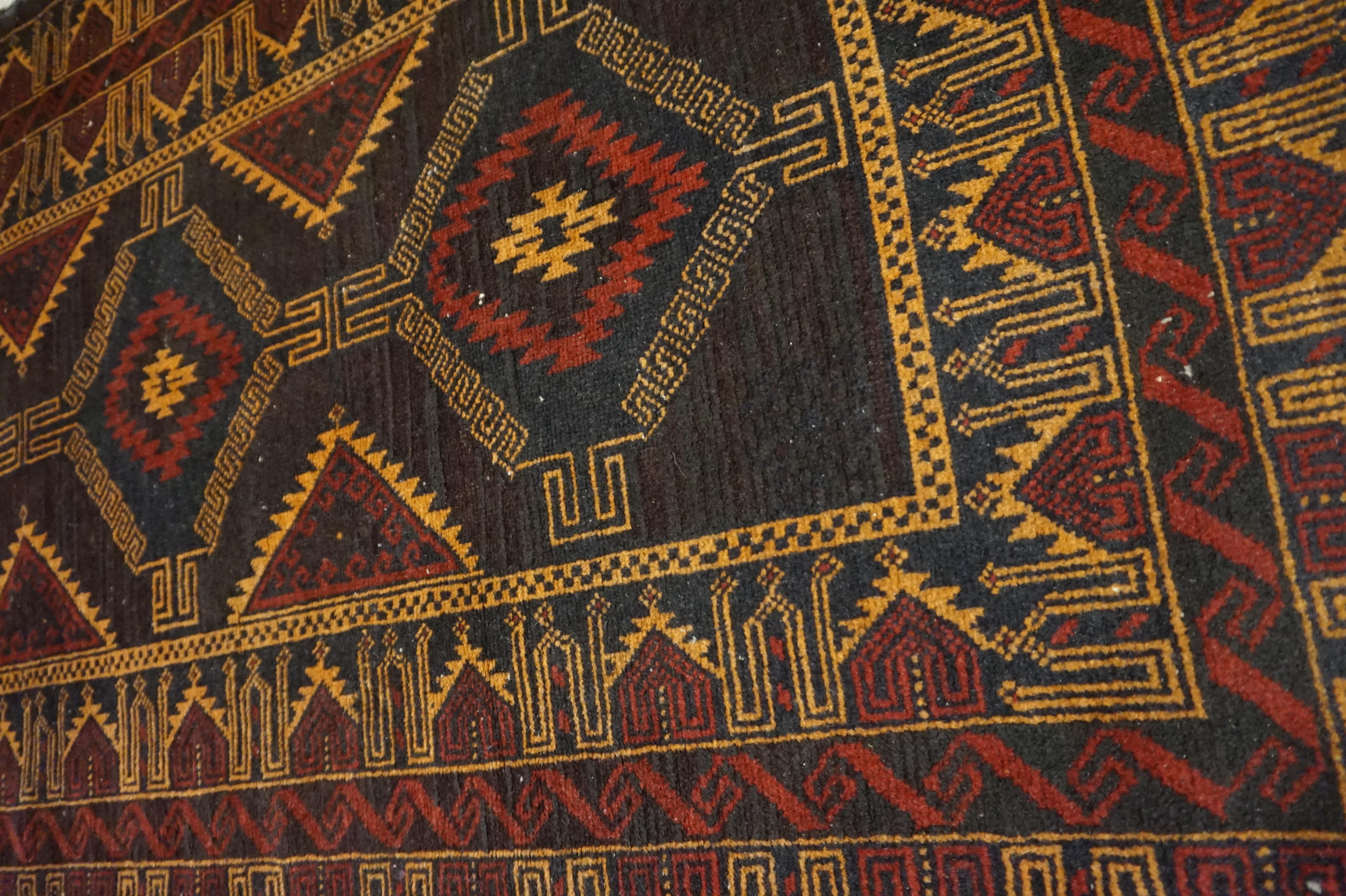 Fine Hand Knotted Semi-Antique Wool Baluch Tribal Rug In Good Condition In Vancouver, British Columbia