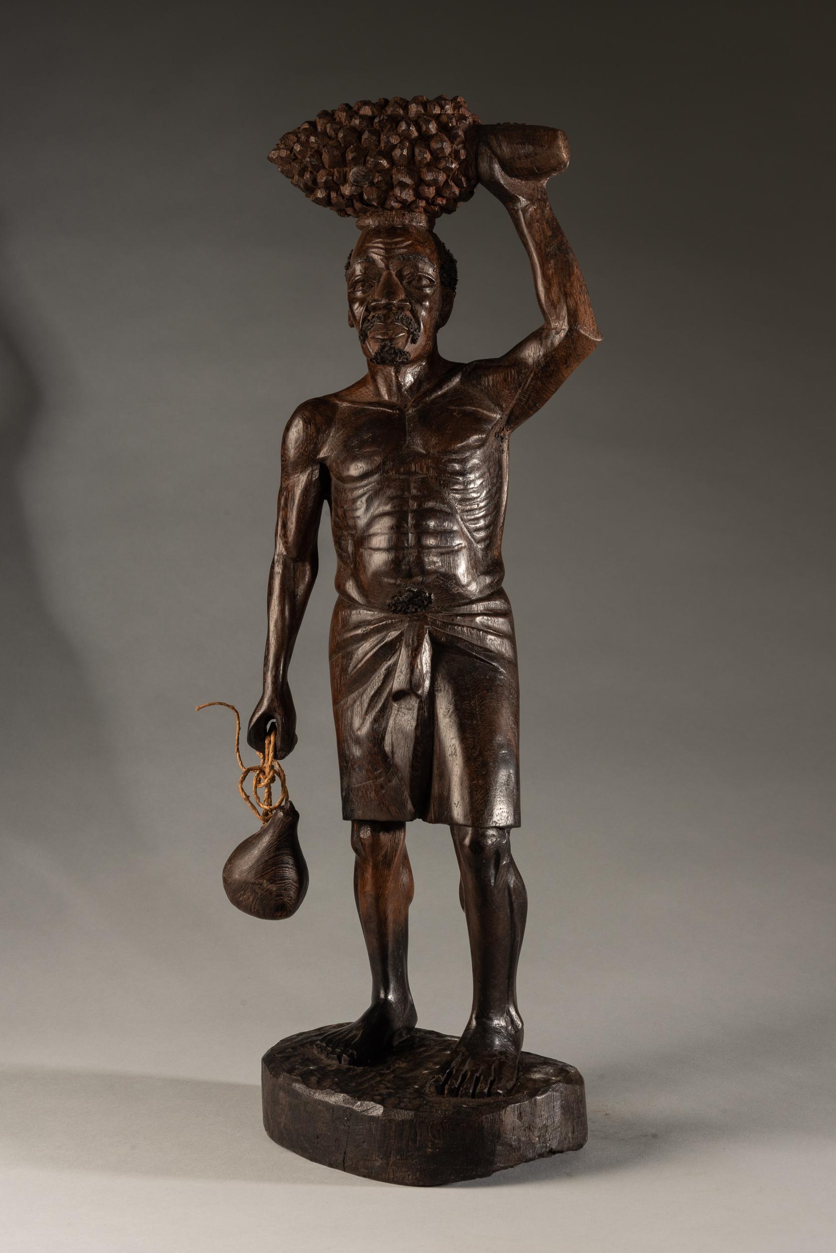 Congolese Fine Hardwood Sculpture of Bearded African Man Carrying a Kalabas