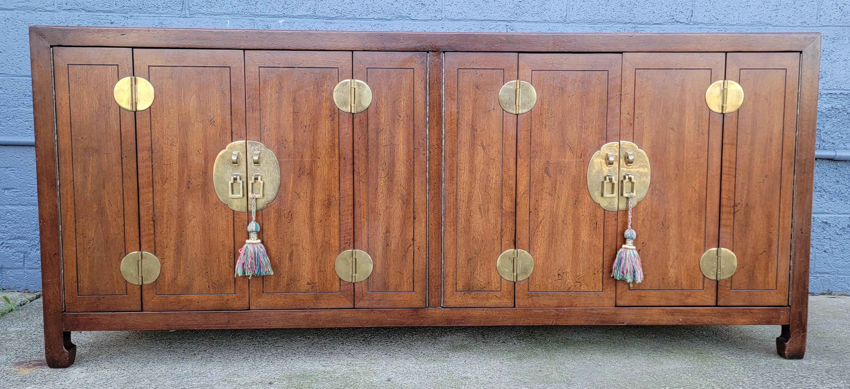 A finely crafted Asian influenced credenza by Henredon titled by maker 