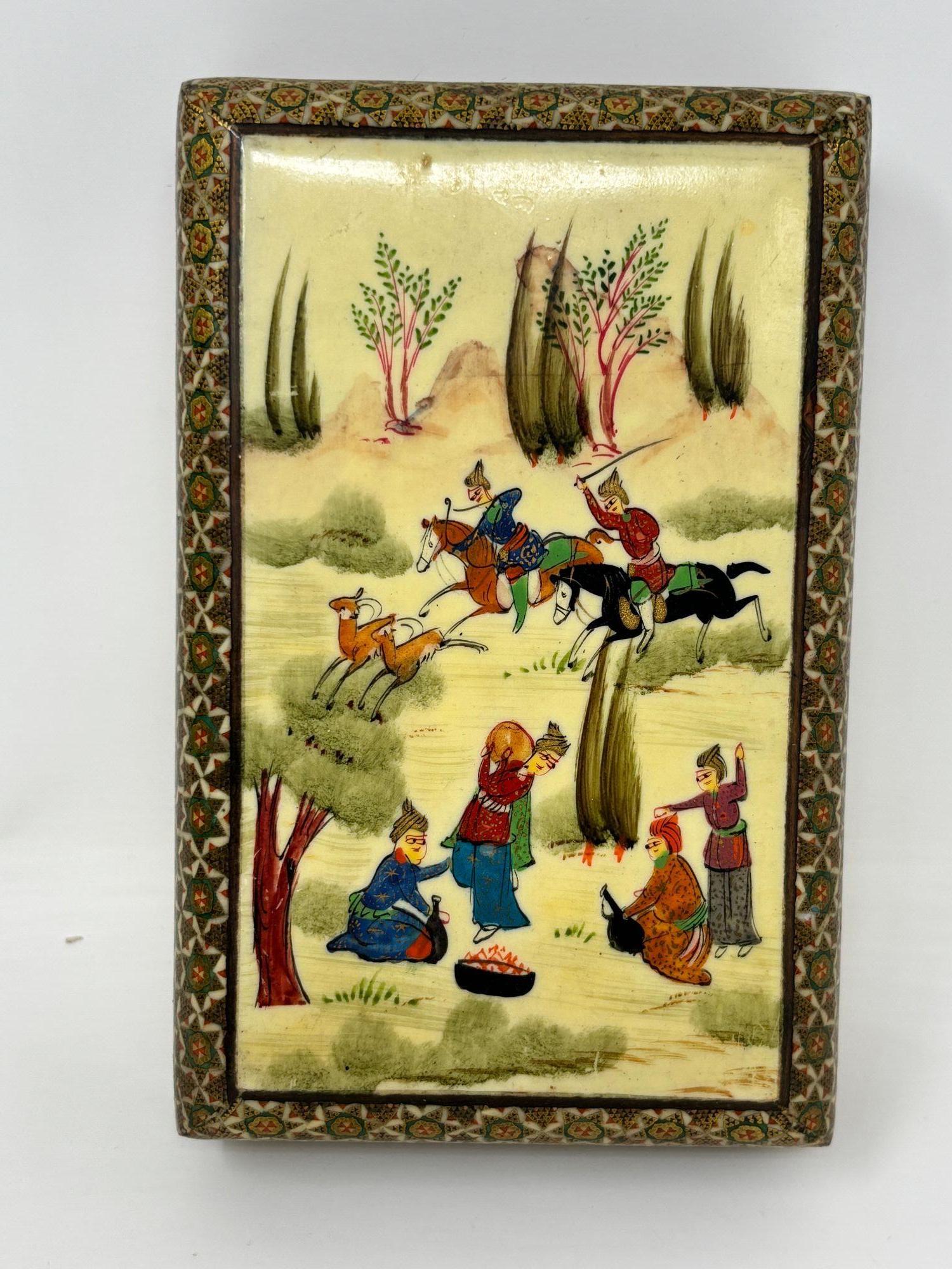 Fine Micro Mosaic Indo Persian Moorish Inlaid Trinket Jewelry Box with Miniature Polo Scene, circa 1940s
Exceptional handcrafted Indo-Persian jewelry or pen box featuring intricate Sadeli micro mosaic marquetry with inlaid geometric designs and a