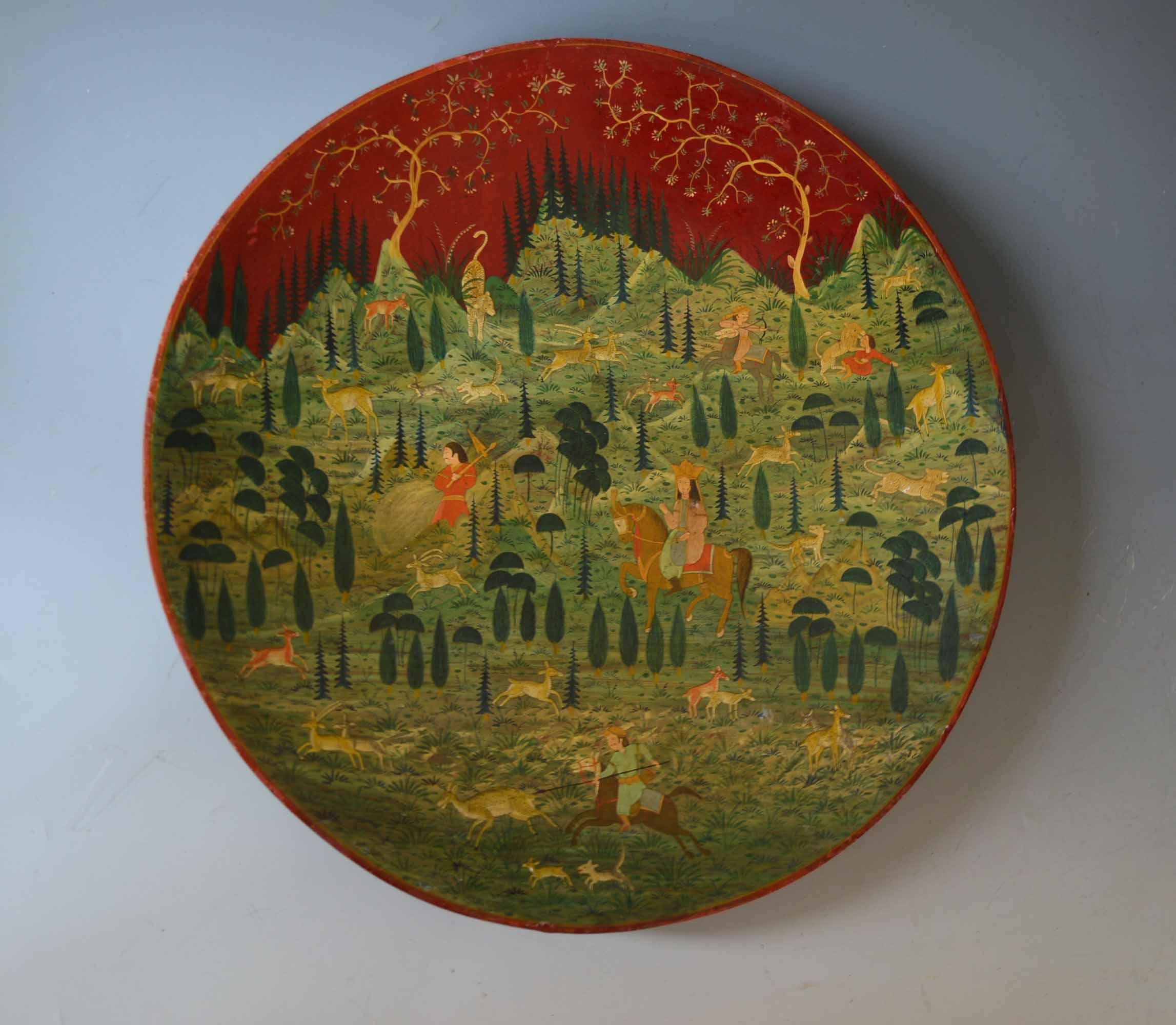 Fine Kashmiri Indo Persian Mughal Painted Wall Plate Interior Design Asian Antiques

A large very fine Kashmiri Indo Persian style hand-painted papier Mache plate featuring an elaborate hunting scene with a deer and wild feline attacking persons,