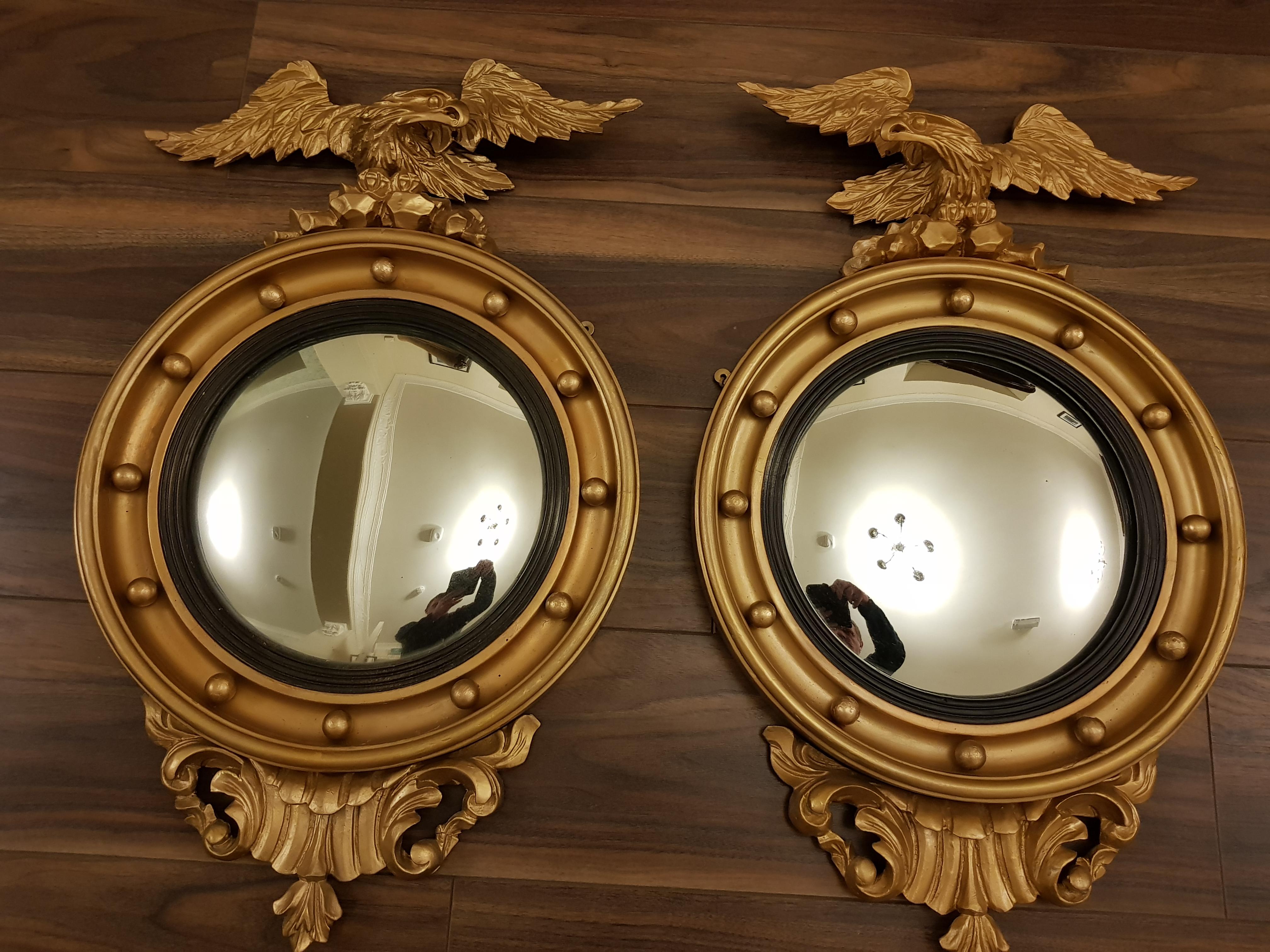Fine pair of Irish 19th century gilt convex mirrors with Irish provenance.