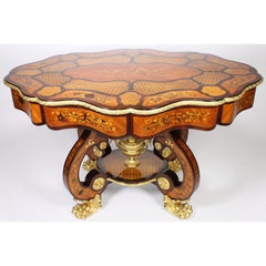 Table centrale italienne du 19ème siècle montée sur pieds en bronze doré avec marqueterie florale