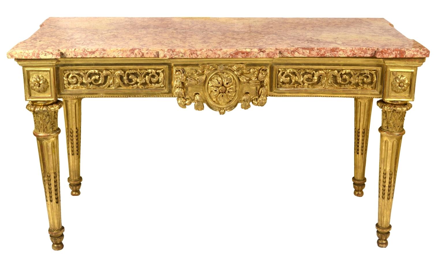 Fine Italian carved and giltwood neoclassical console table, the original marble top (Spanish Brocatelle) over the apron with a center medallion mounted with a large floral boss and bell flower swags; the inset panels with applied leaves, scrolls