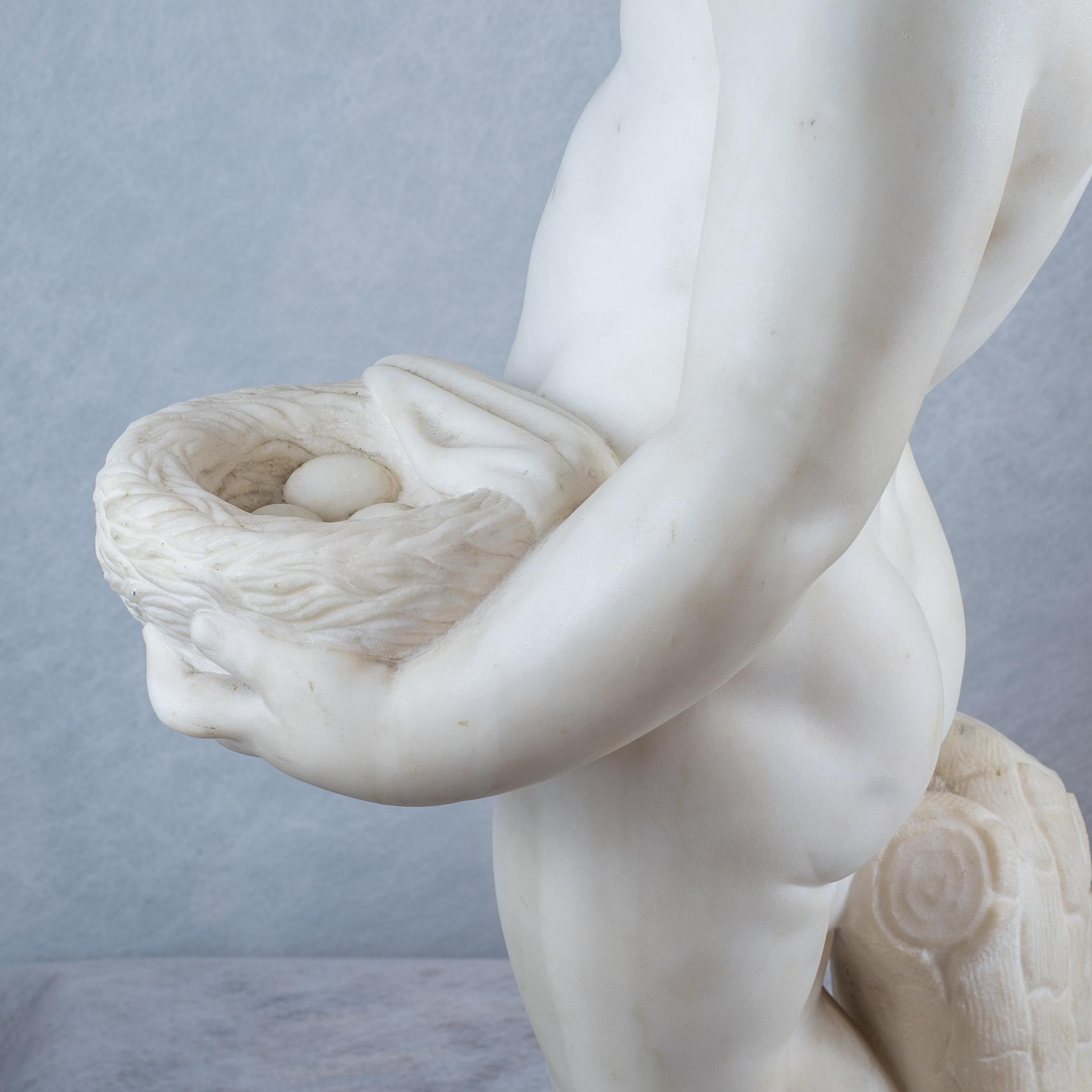 White Marble Sculpture Statue of a Boy Holding a Nest In Good Condition For Sale In New York, NY