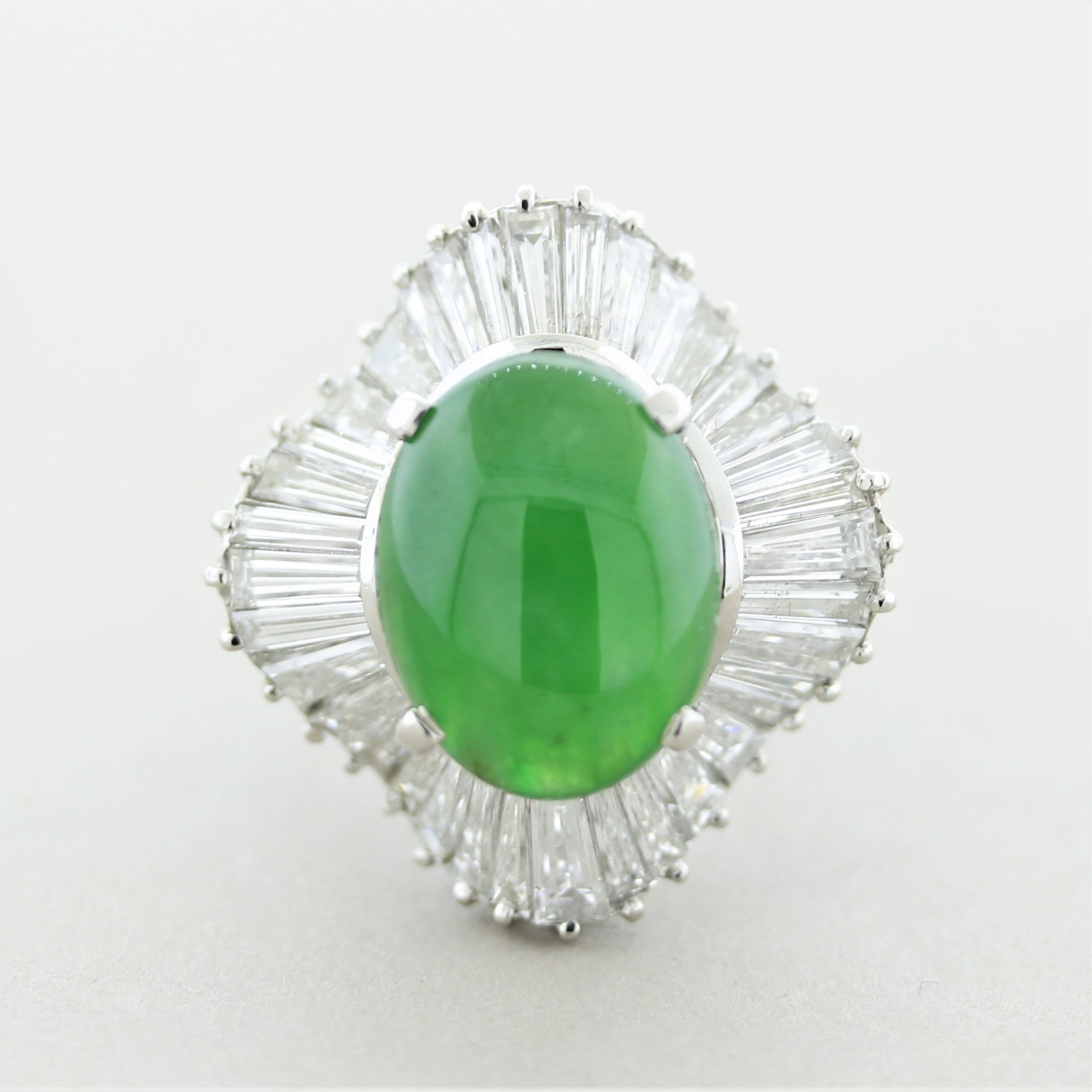 A large, bold, and impressive cocktail ring featuring a superb gem jadeite jade. It weighs 8.94 carats and has a rich vivid grass green color. Adding to the list of superlatives, the jade is completely natural with no treatment, known as “Type A.”