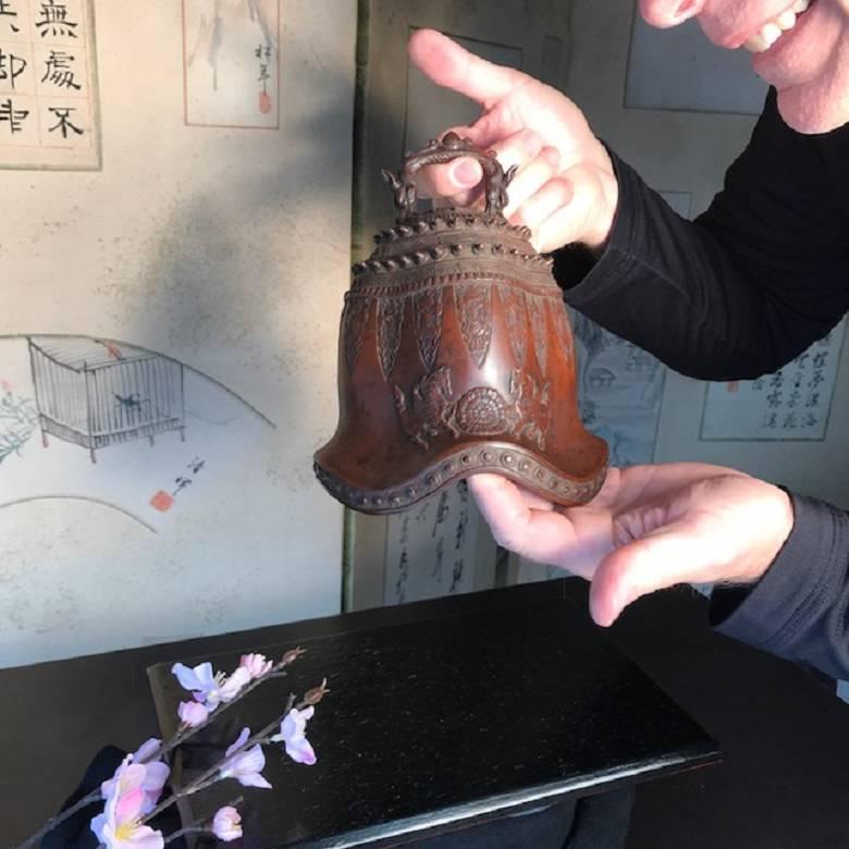 An unusual find from Takayama during our recent acquisitions trip to Japan.

This superbly caste antique red bronze fire bell size form came out of an old Kura and a generations old Takayama Edo roots family collection. The unusual undulating base
