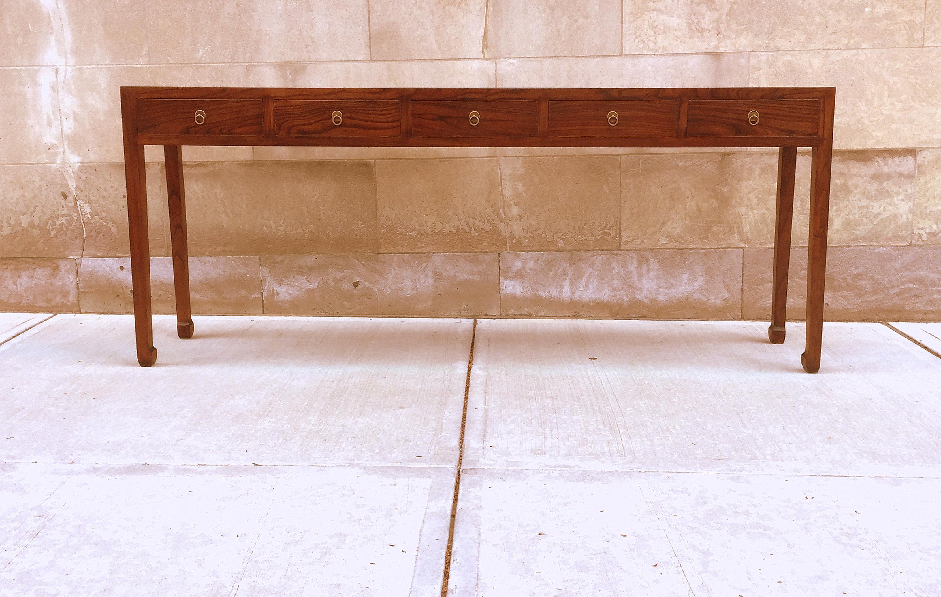Fine Jumu wood console table with five drawers and brass fitting. Simple and elegant form. We carry fine quality furniture with elegant finished and has been appeared many times in 