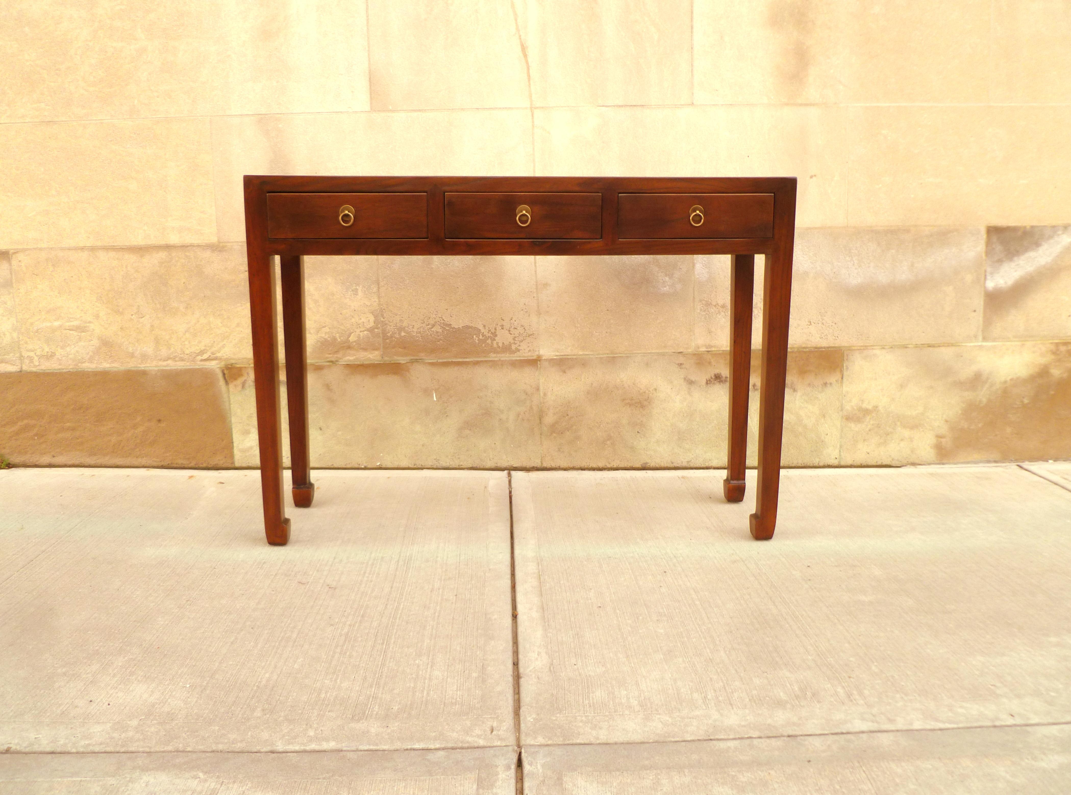 Fine Jumu console table with three drawers. Very elegant and fine quality. Beautiful color and simple form. We carry fine quality furniture with elegant finished and has been appeared many times in 