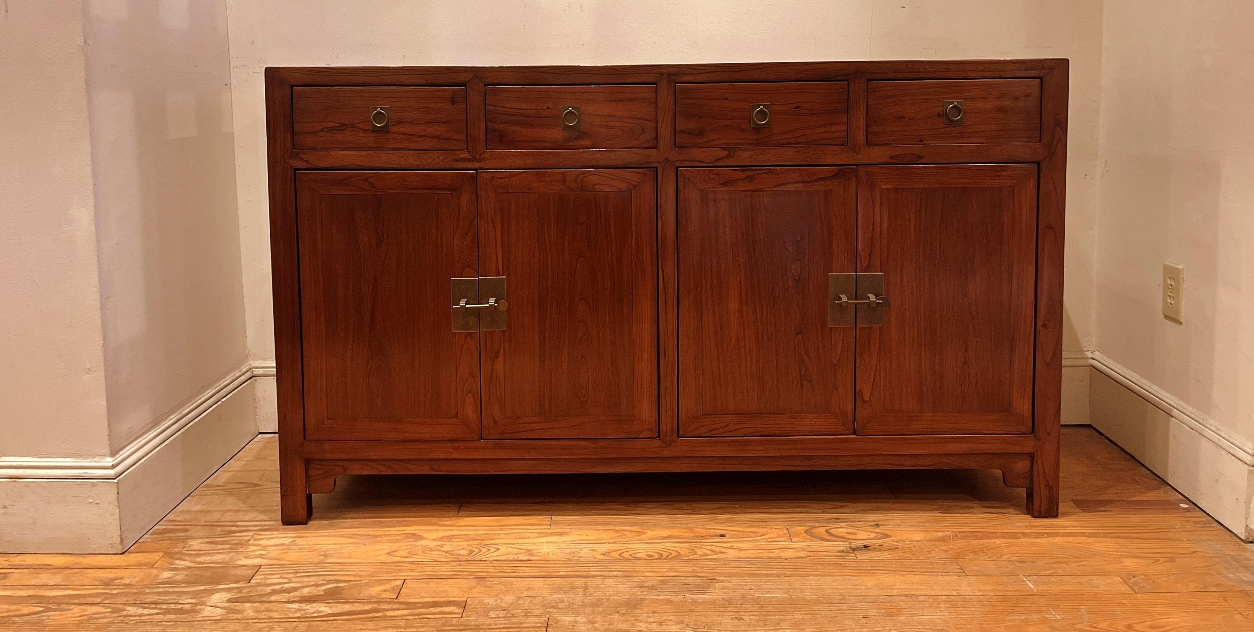 Fine Jumu wood sideboard with drawers and two pairs of open doors. Simple and elegant sideboard. Beautiful form and color. We carry fine quality furniture with elegant finished and has been appeared many times in 