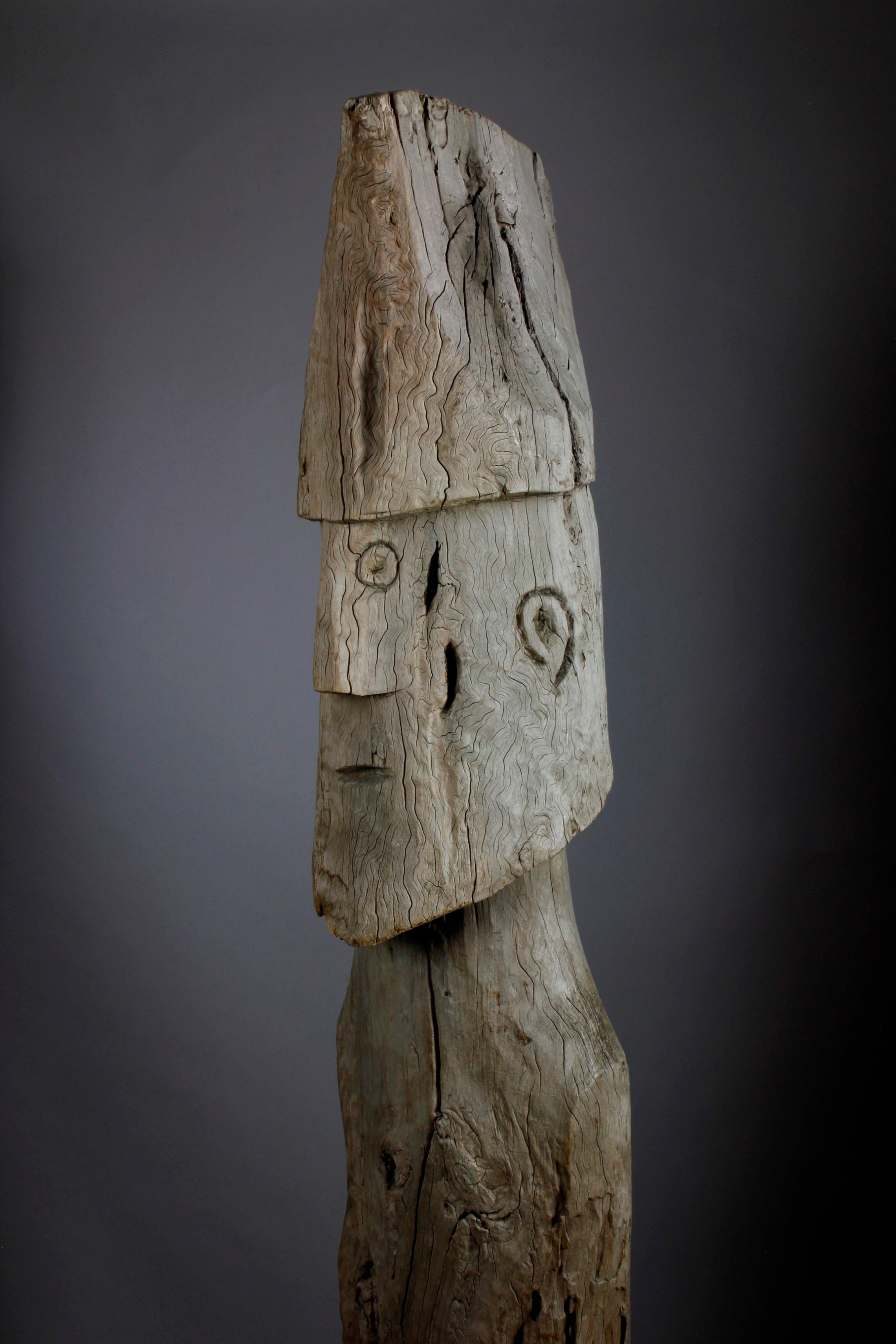 This large figure, with a beautifully eroded surface, is a memorialisation in wood of a male Konso ancestor. Ancestral figures such as this (named 'waaka' or 'waaga') memorialise 'xhe-tallitta' (heroes) of the highest rank of the Gada grade, certain