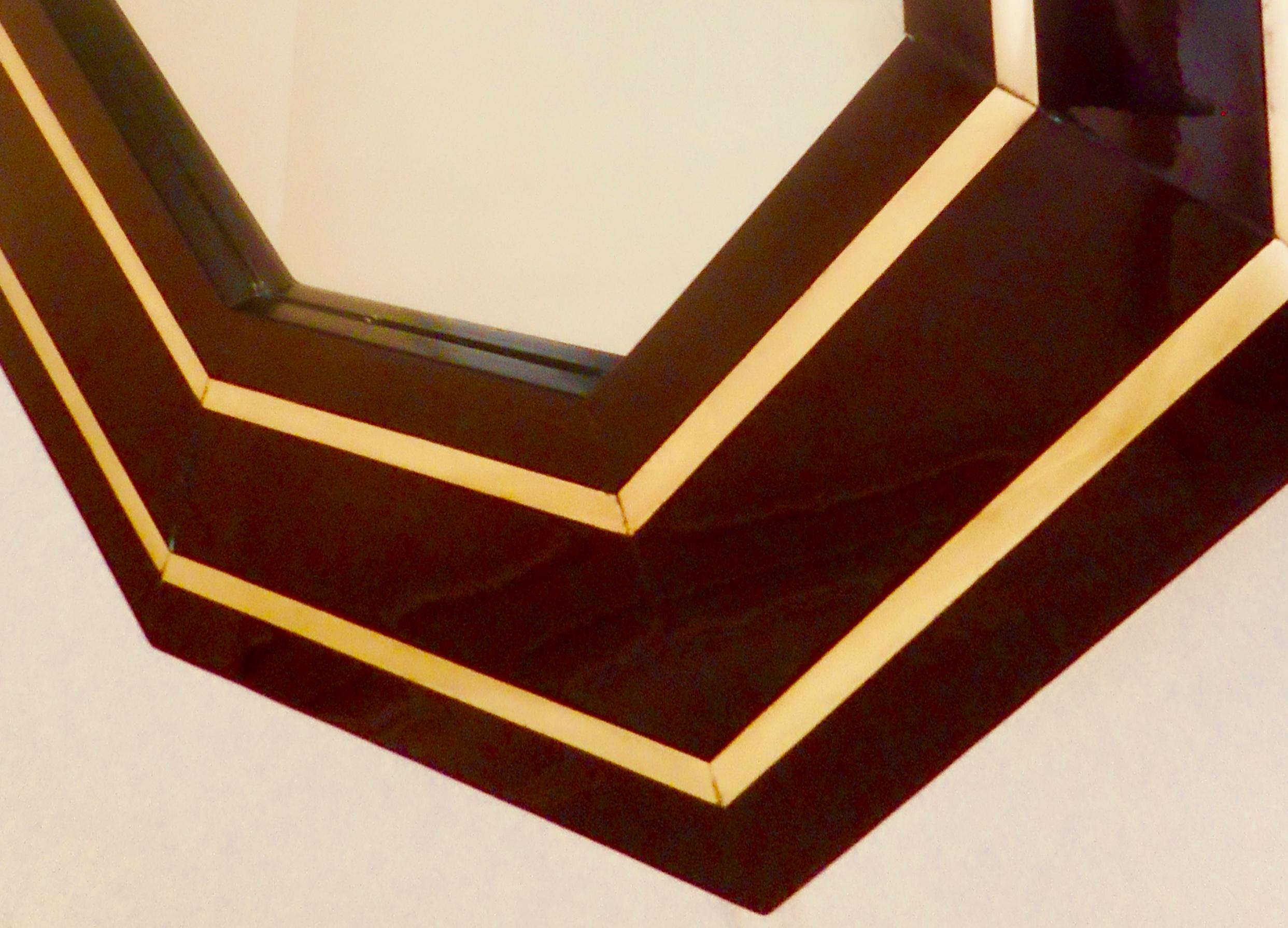Dark burgundy red (almost black) lacquered hexagonal mirror by Mahey.
Labelled at the back.
France, 1975.