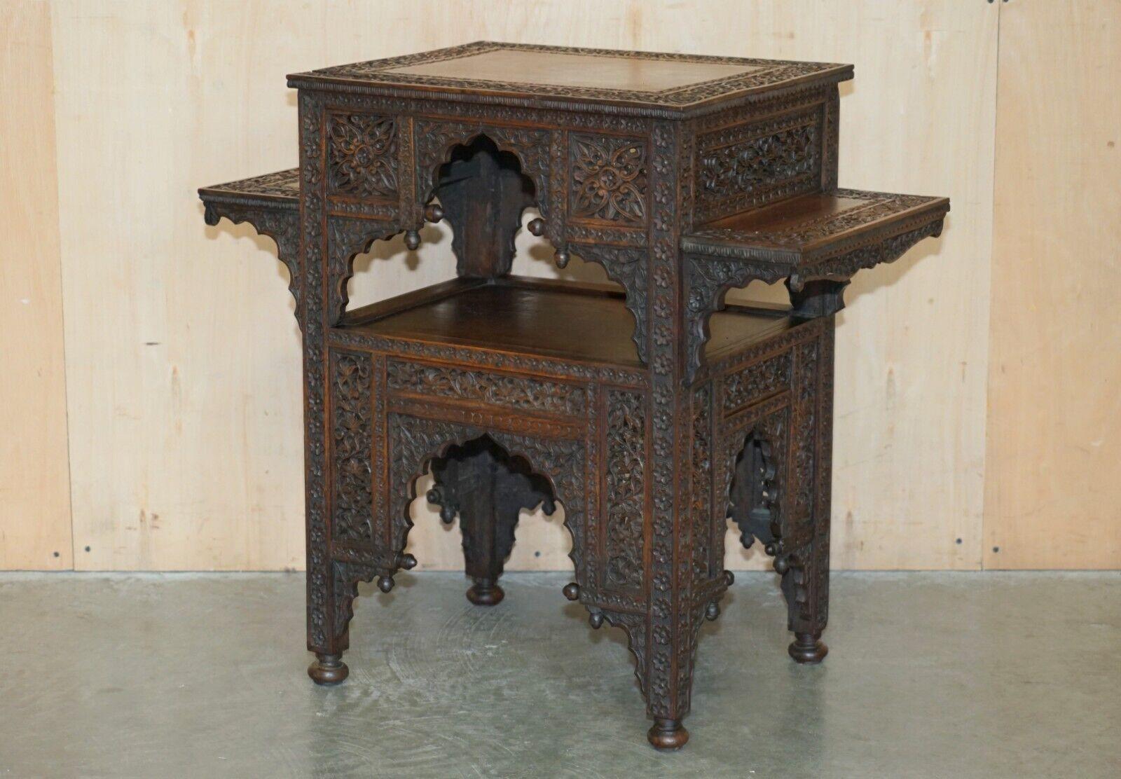 Royal House Antiques

Royal House Antiques is delighted to offer for sale this exquisite, hand carved from top to bottom, four tier Liberty's of London Moorish occasional table 

Please note the delivery fee listed is just a guide, it covers within