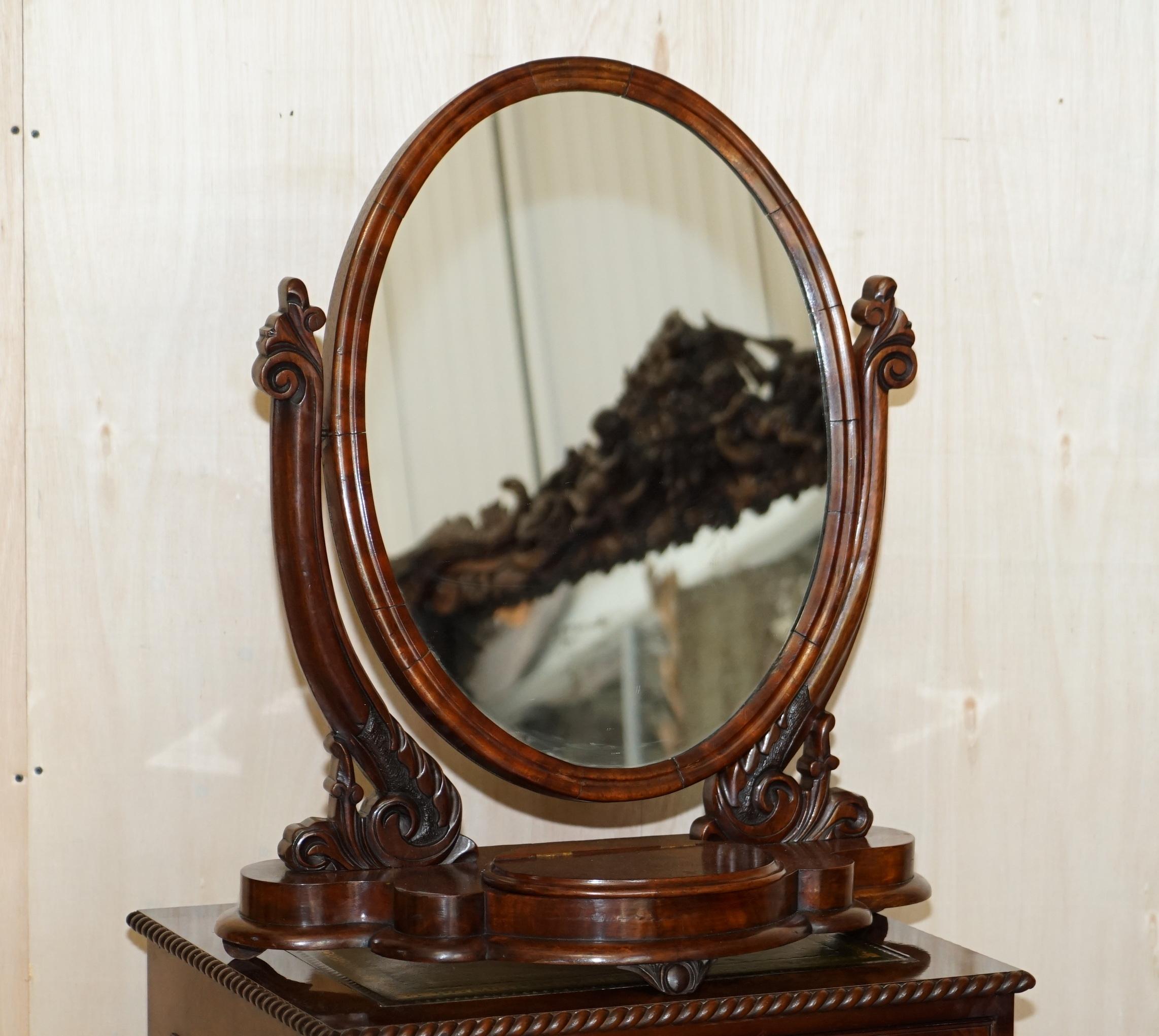 We are delighted to offer this very fine, large table top Cheval mirror in flamed mahogany circa 1860-1880

A very good looking and well made piece, the timber patina is glorious, the mirror has a little jewellery box in the middle which is baize