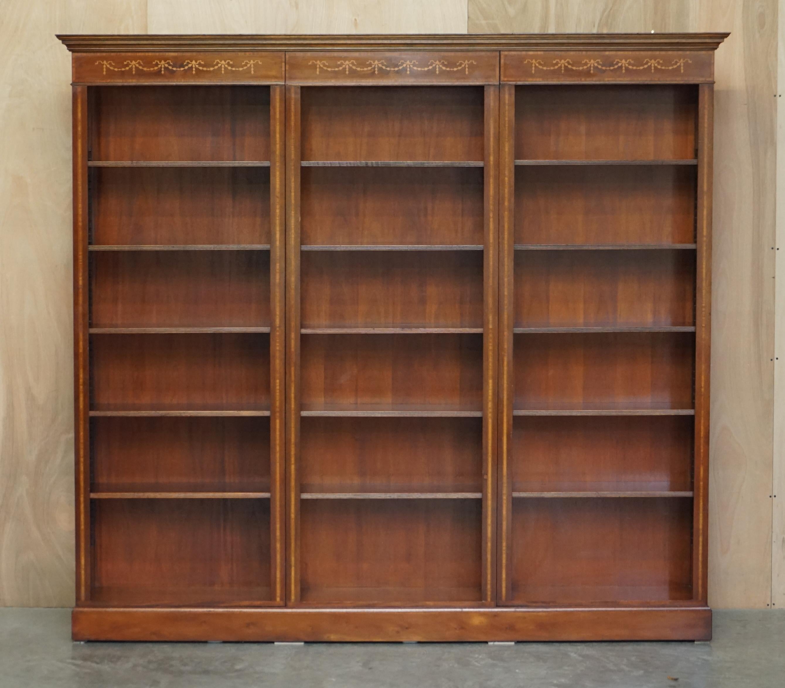We are delighted to offer for sale this lovely vintage Burr Walnut, Marquetry inlaid, triple bank, open library bookcase with height adjustable shelves 

A very good looking well made and decorative open library bookcase, the shelves are fully