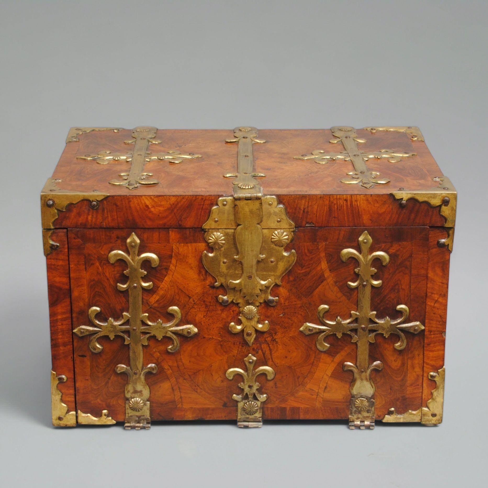 A superb early 18th century kingwood oyster veneered coffre fort with fine gilt brass metal work, the fall front opens to reveal three drawers and three hidden compartments.
Lovely colour and patina.
Circa 1700