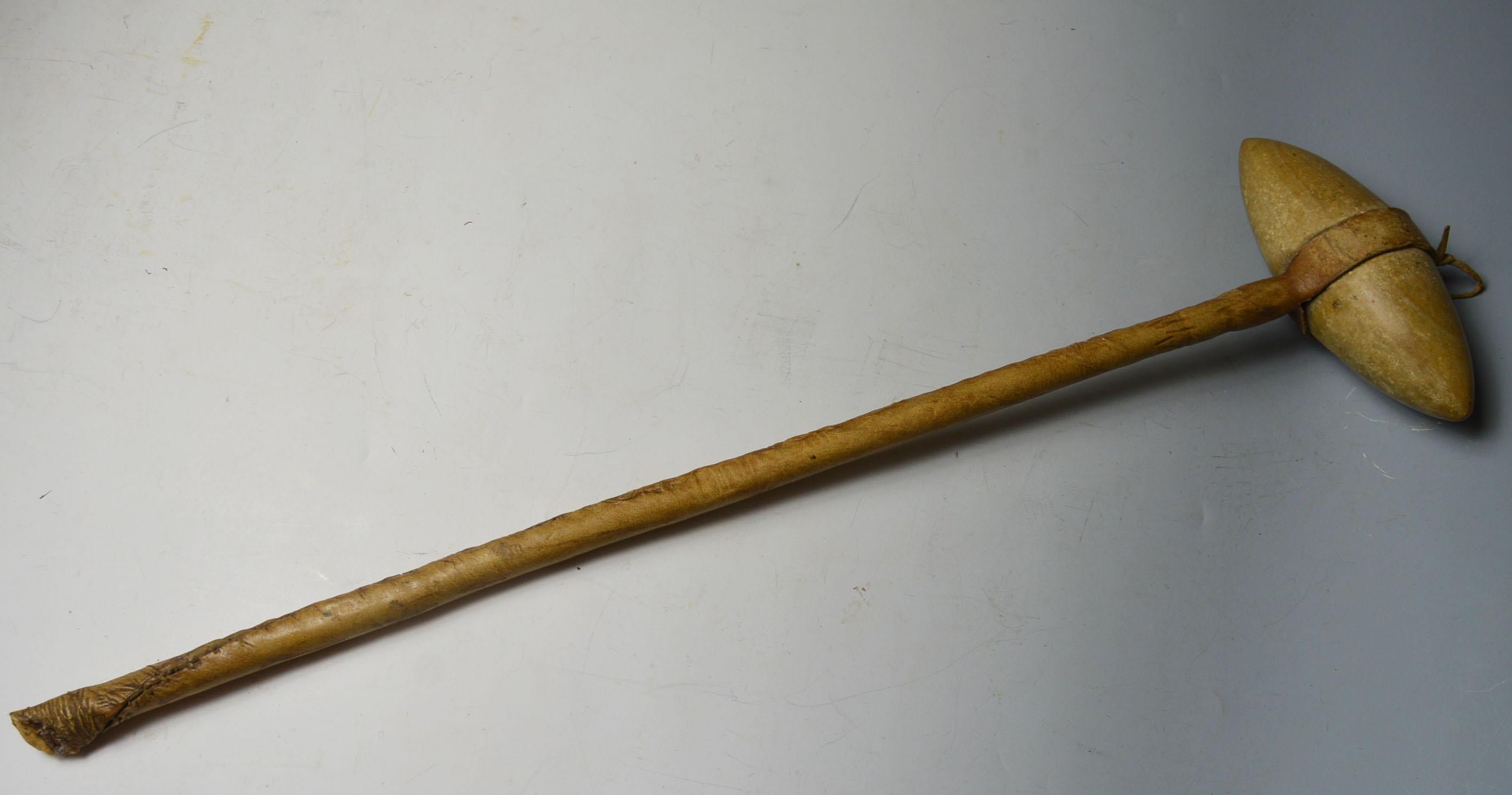 Native American Indian plains beaded skull cracker club
The hide wrapped club with large pointed stone head
Measures: Length 62 cm, width 17 cm
Period: Last quarter of the 19th century or earlier
Ex Mason UK collection.
Acquired Christie's 8th