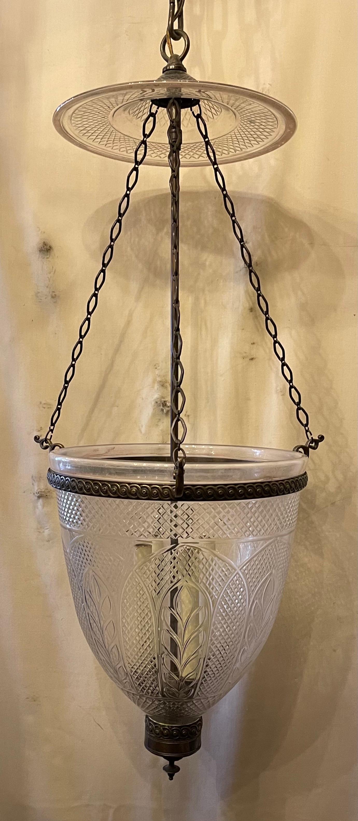 A wonderful large vintage Vaughan lighting etched glass / crystal bell jar lantern in a diamond pattern with leaf fern details and bronze housing and decorative chain in the neoclassical / Regency style, this fixture has 4 candelabra internal lights