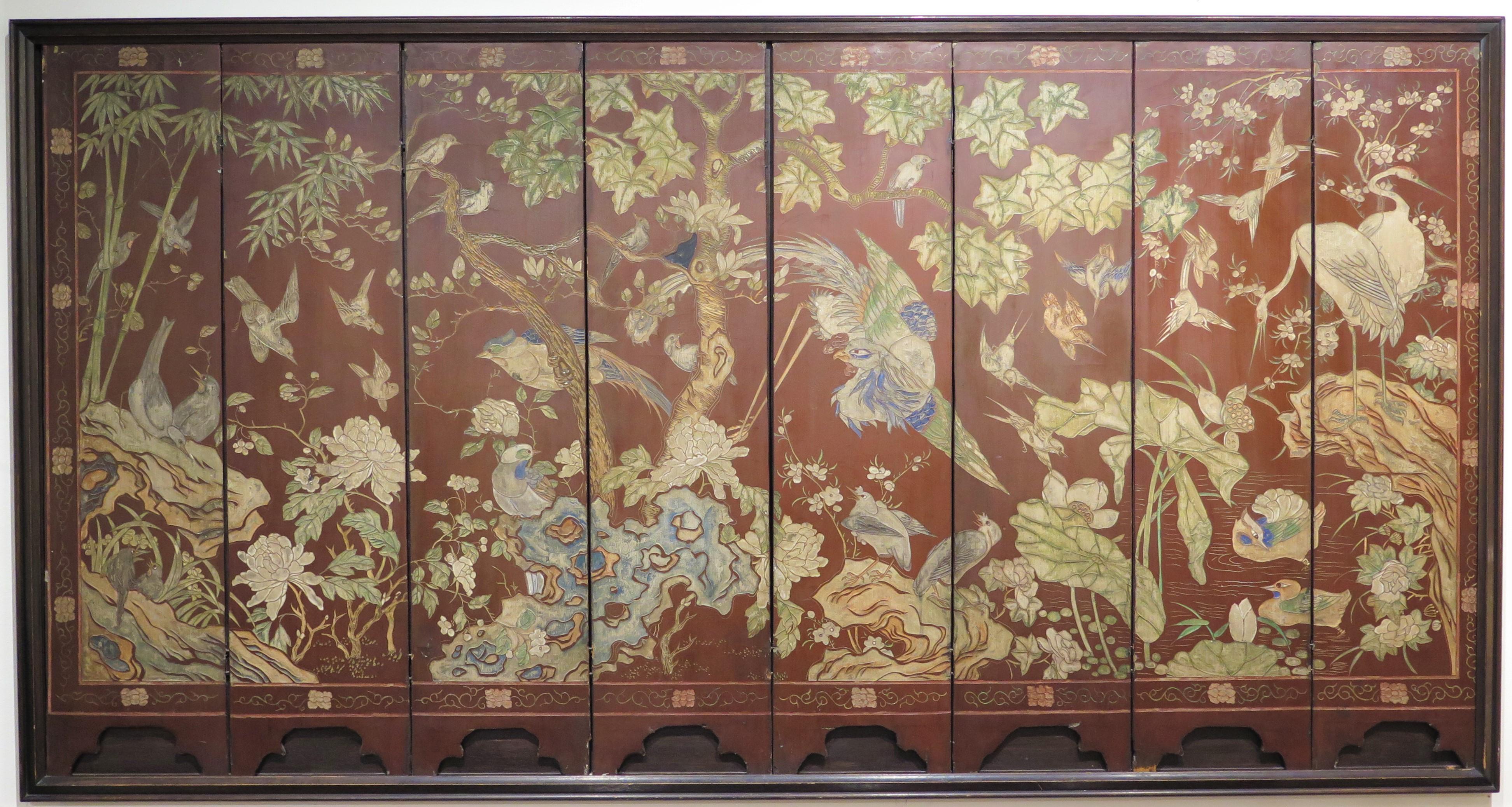 Fine Late 18th early 19th Century eight (8) panel Chinese coromandel framed screen. All the panels are finely Carved and hand-painted with images of birds, flowers and foliage against a cinnamon background. China. Circa 1800 

48.75