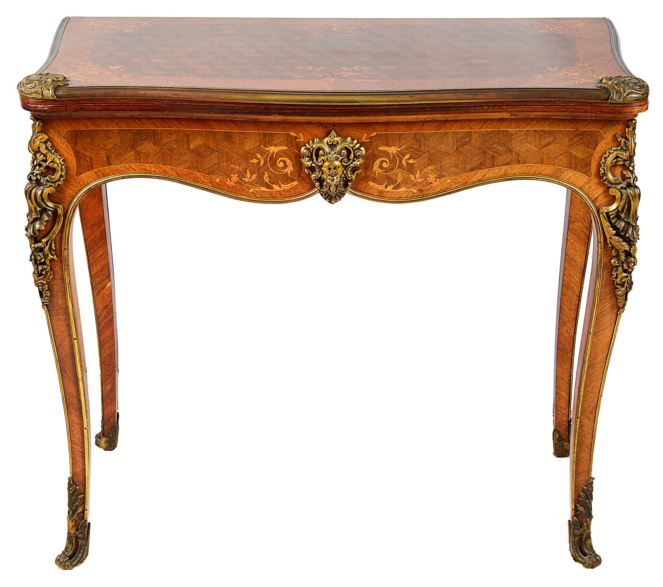 A fine quality late 19th century parquetry inlaid, ormolu-mounted card table.