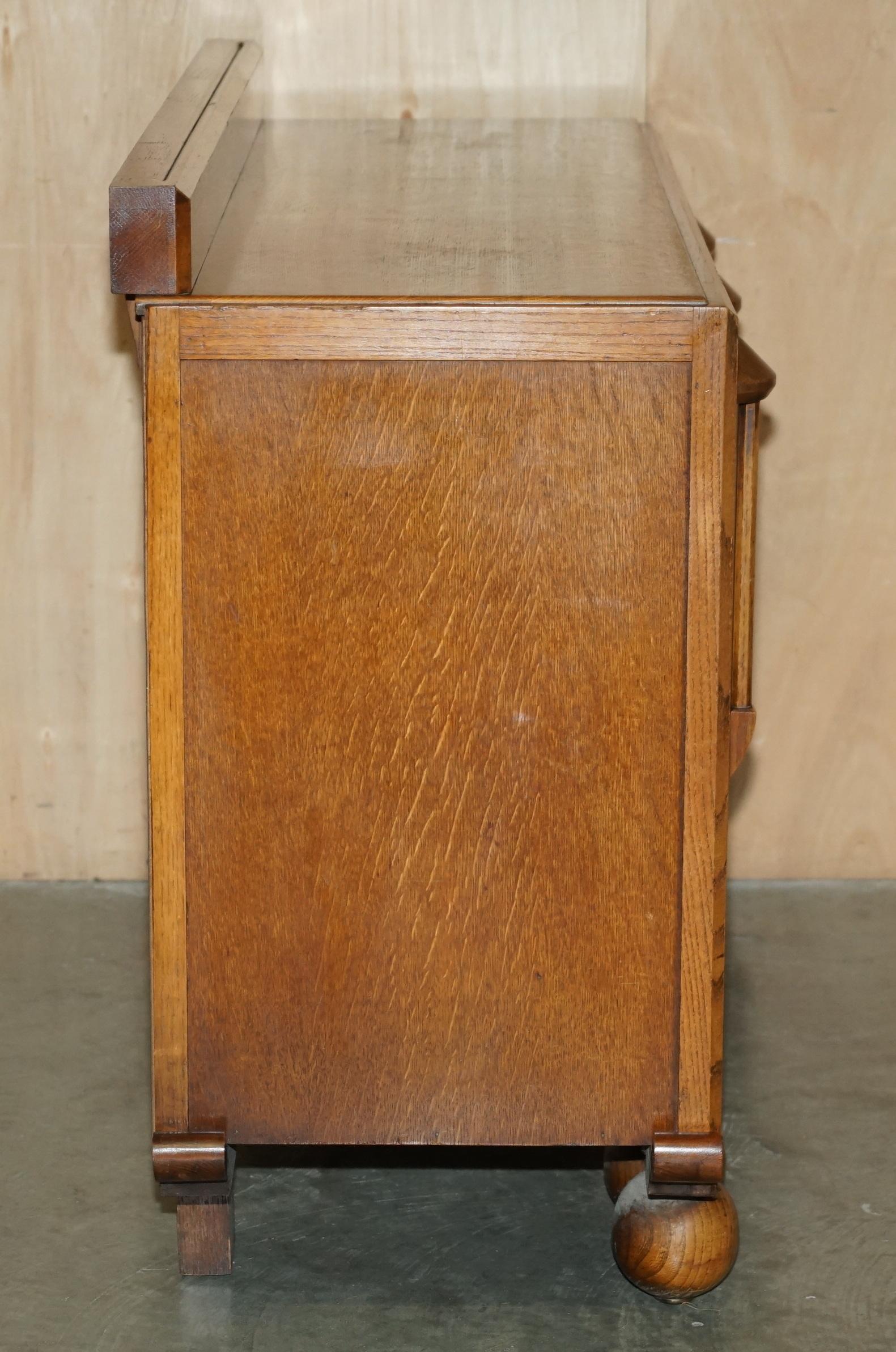 FINE LIBERTY'S COTSWOLD ART DECO OAK CARVED SiDEBOARD CIRCA 1920 PART OF A SUITE For Sale 7