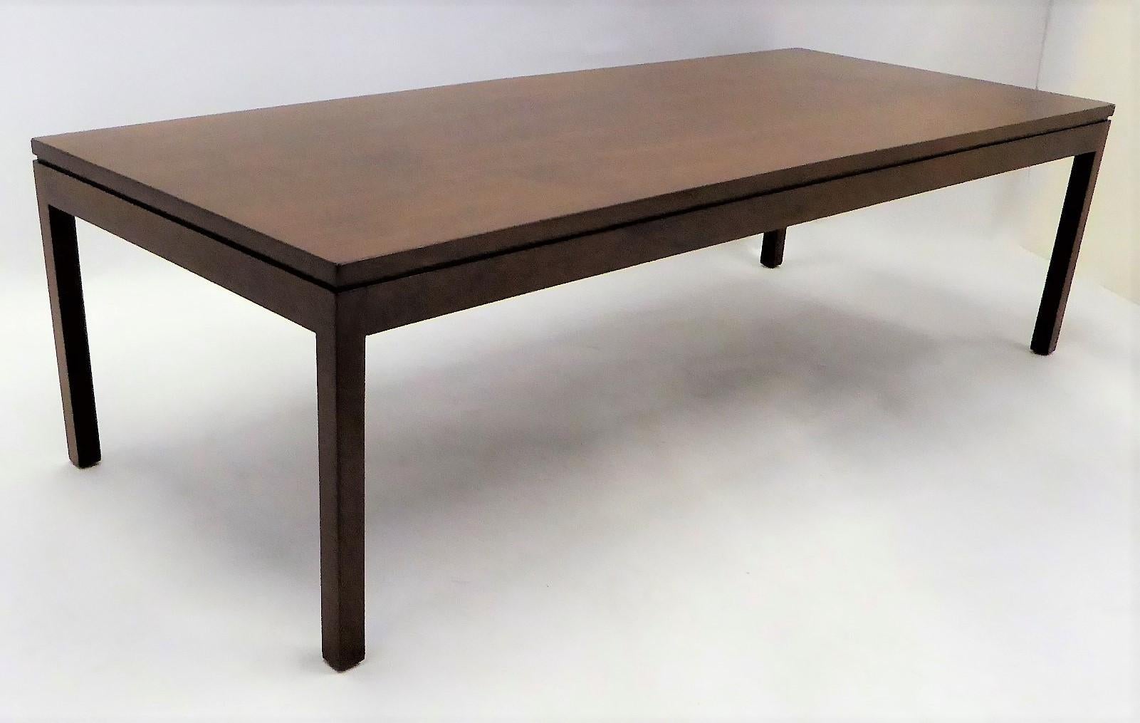 REDUCED FROM $1,500....Wonderfully figured Walnut highlights this 1960s long rectangular coffee or Cocktail Table created by Camilo Furniture in Miami.  Beautifully restored finish.  Parson style, long, it serves as a great sofa table and has a very