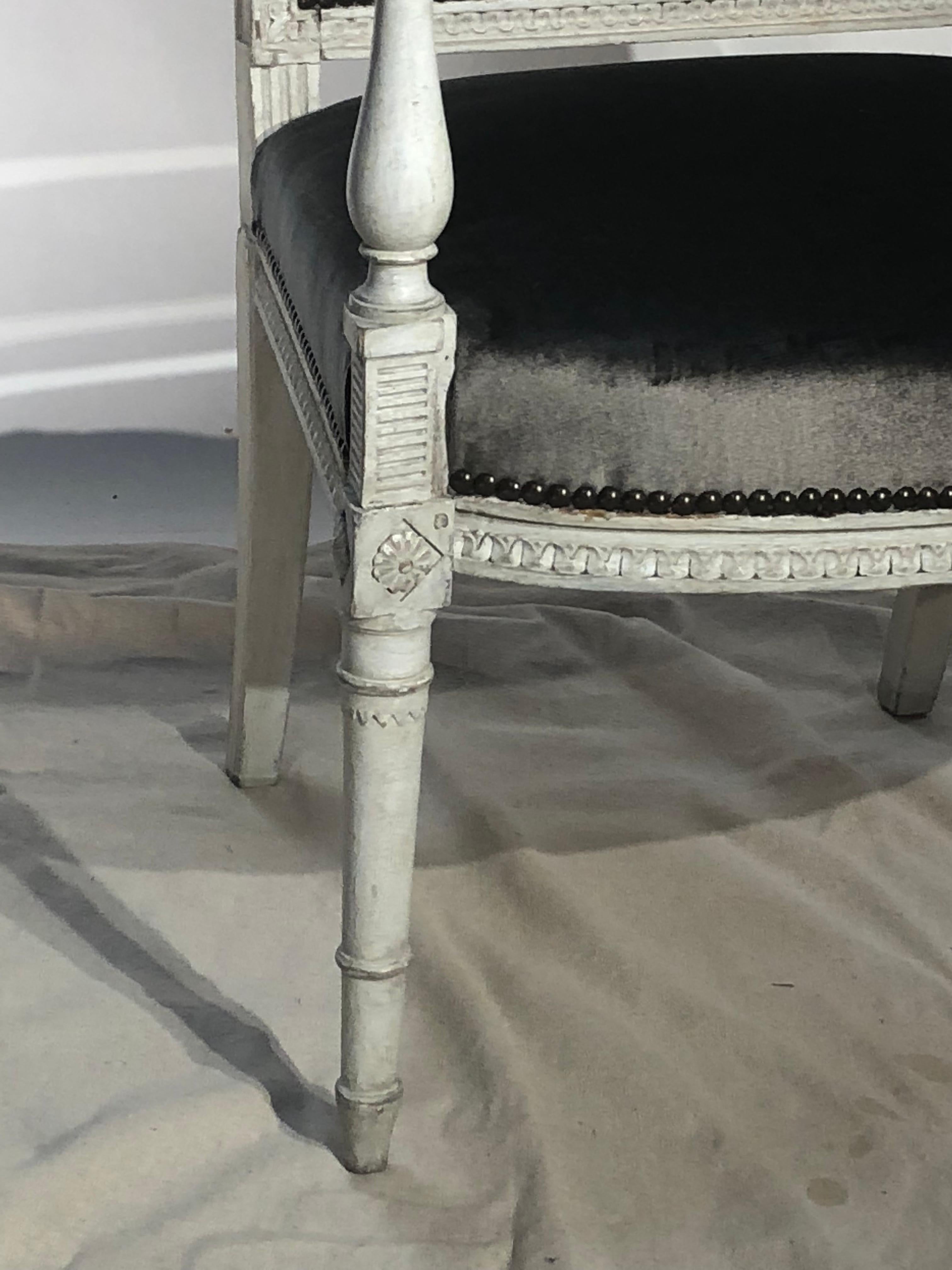 A fine Louis XVI period Fauteuil in grey painted finish, by Jacob Frères, the sons of George Jacob. The chair is stamped on the underside with their mark and is in excellent condition. It was purchased from a NYC estate that was decorated by Sister
