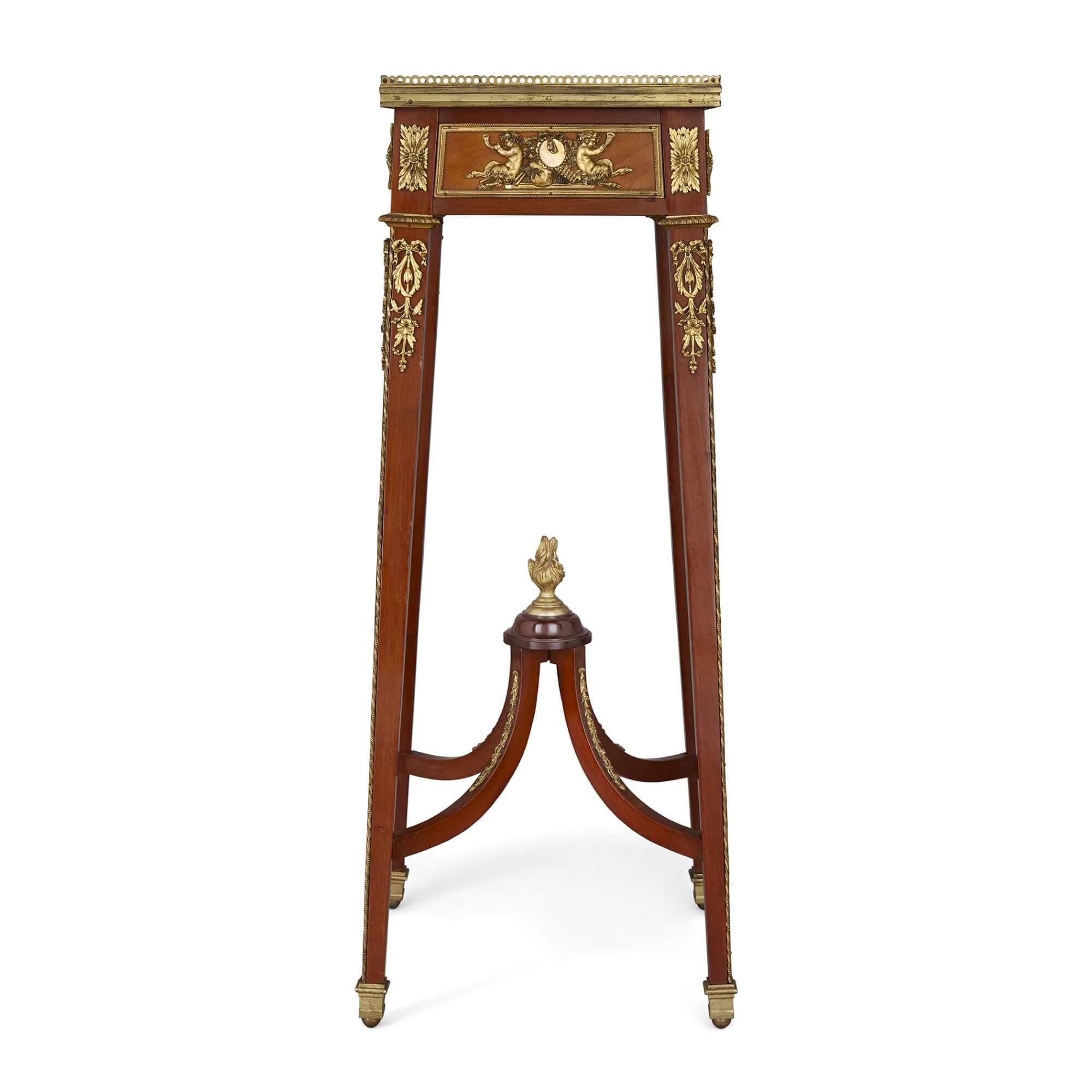 Antique ormolu and mounted mahogany stand with onyx top
French, Late 19th Century
Height 89cm, width 36cm, depth 36cm

Crafted in the Neoclassical style, and taking inspiration from various French royal styles, this tall, distinctive, and delicate