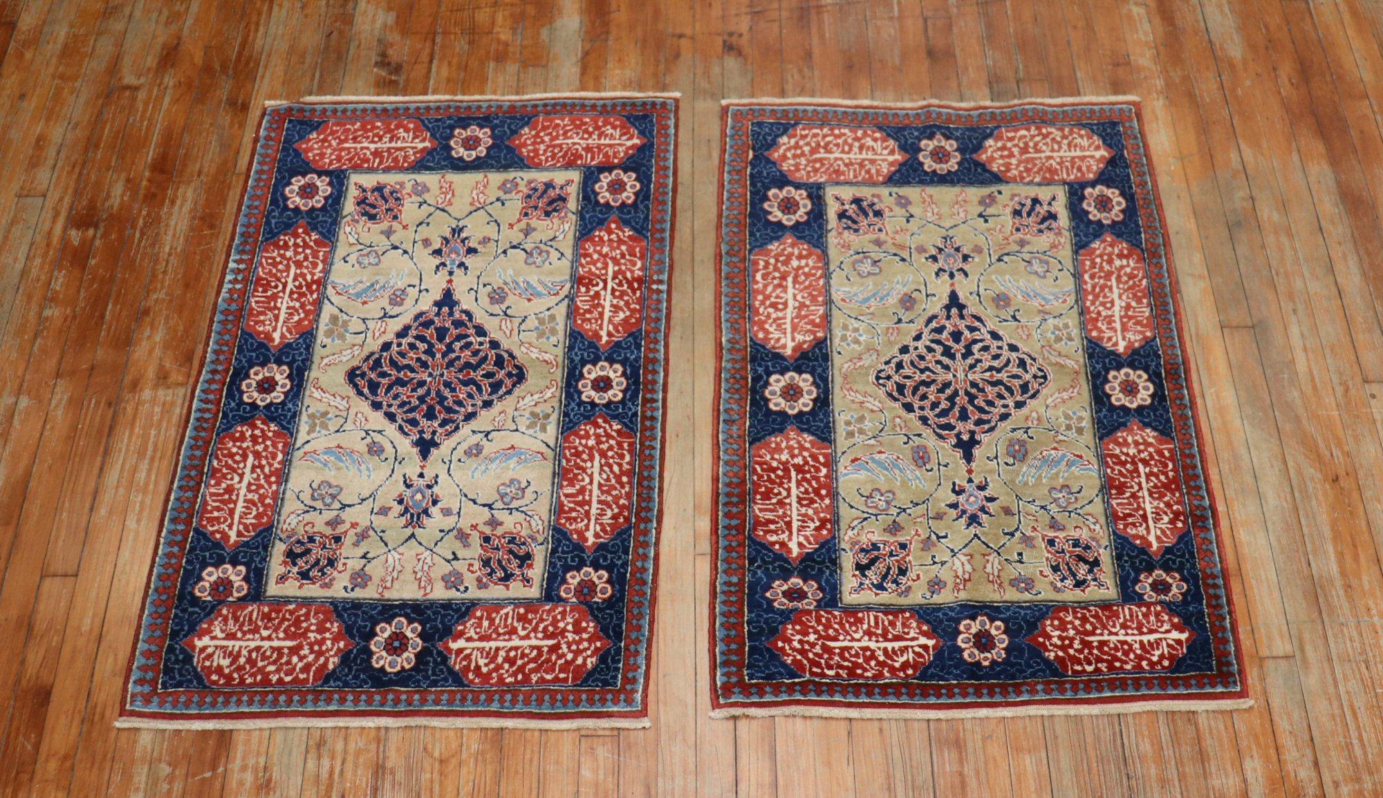 Pair of Persian Tabriz rugs from the 1920s with love poems written in Farsi in both borders

Measures: 2'8” x 4'5” respectively.
  