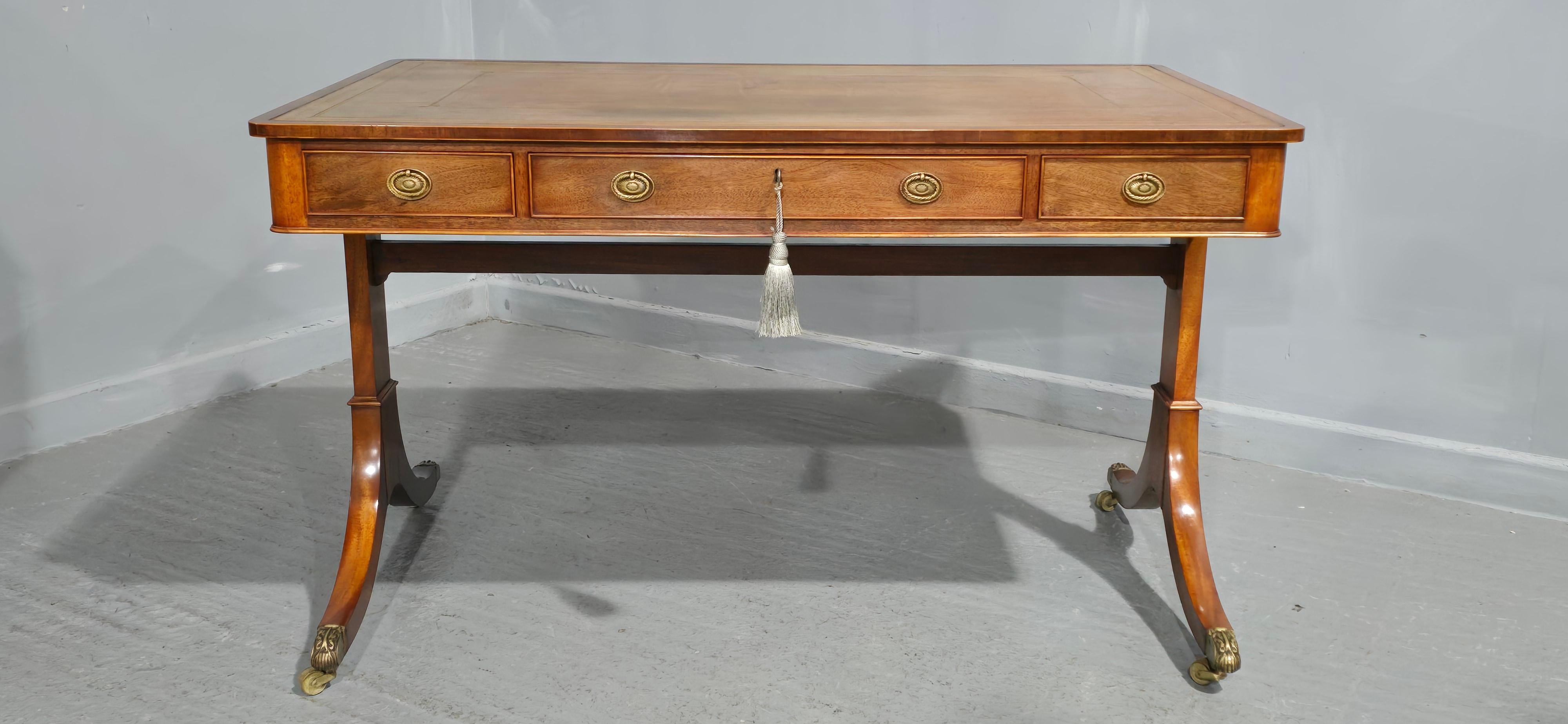 A excellent quality three drawer mahogany writing table, paw castors, original leather top, excellent overall condition.

29