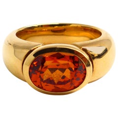 Ring aus Roségold mit ovalem Mandarine Granat 11x8,5 mm.