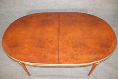 Fine Manner Jansen Burled Walnut Bronze and Brass Trimmed Oval Dining Table